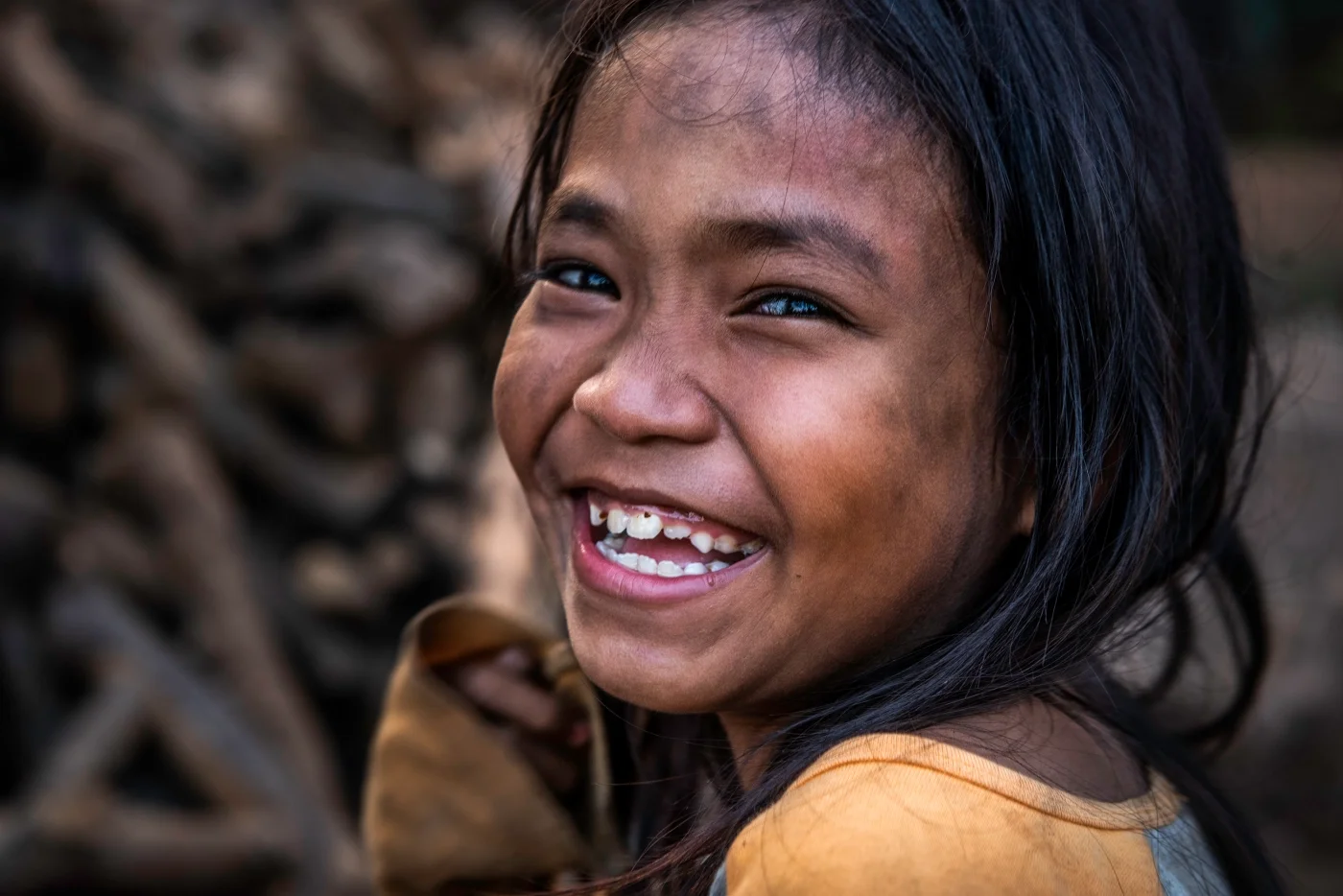 girl-at-phnom-kram-village.webp
