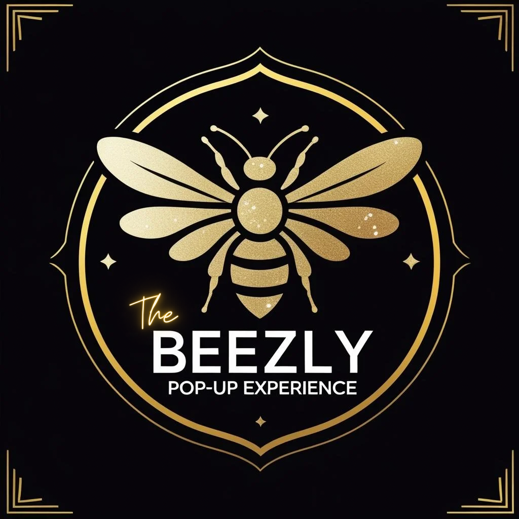 Gold bee illustration with the text 'The Beezly Pop-Up Experience' on a black background with decorative gold borders.