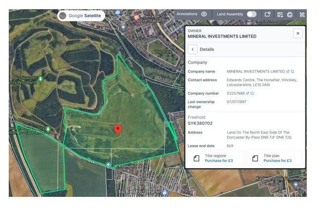 Satellite map showing land owned by MINERAL INVESTMENTS LIMITED, bordered by green lines, with surrounding residential and wooded areas.