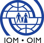 Logo of the International Organization for Migration (IOM), featuring a globe with three figures standing on a platform