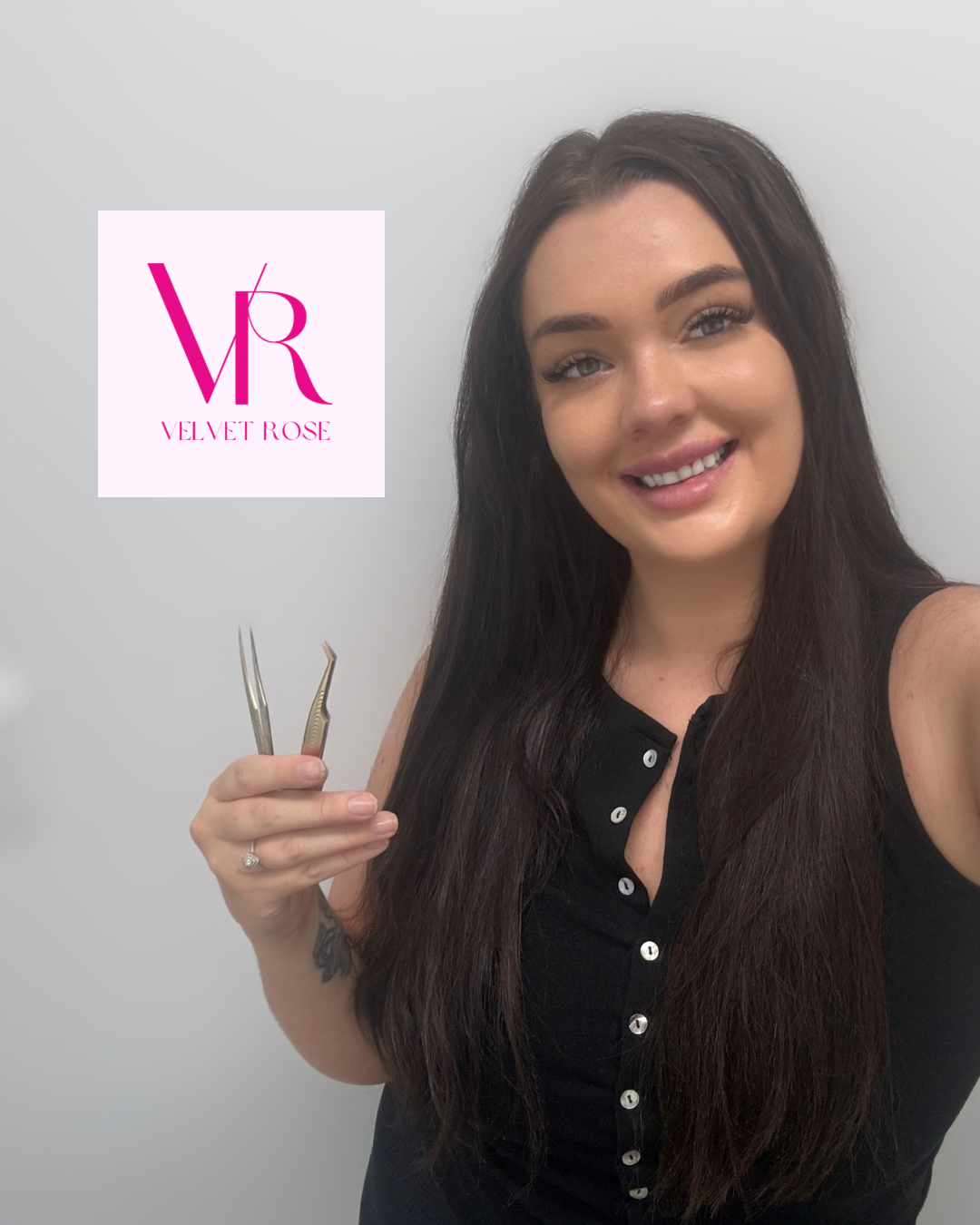 A woman with long dark hair holding nail scissors, smiling, standing against a white background with a logo that reads 'VR Velvet Rose'.