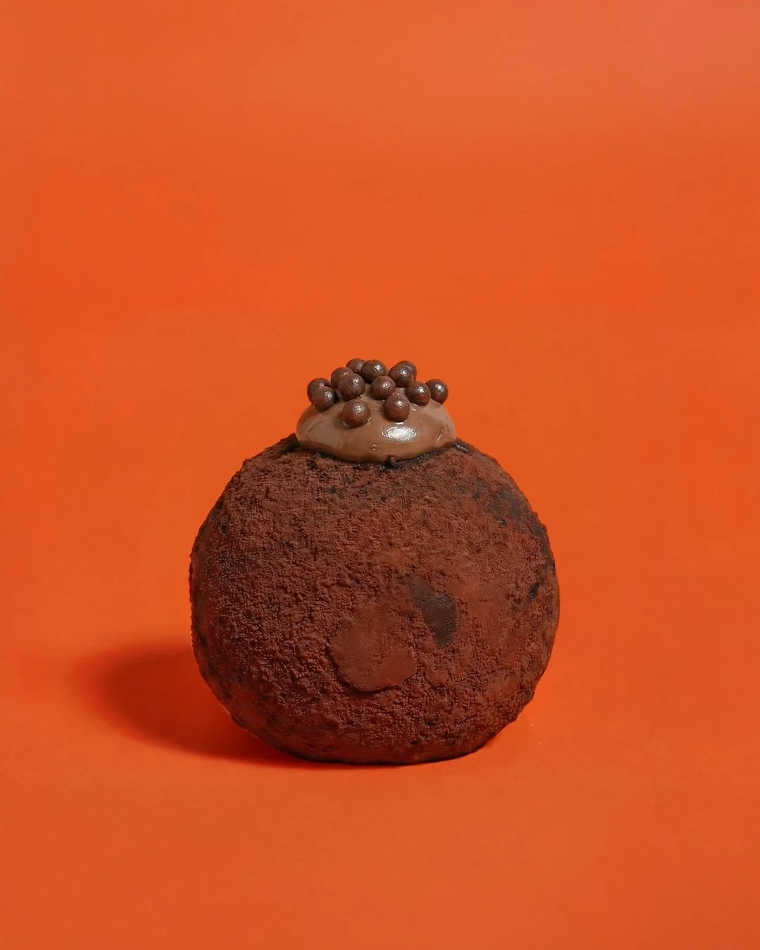 Chocolate nama donut with cocoa powder coating and ganache topping, fresh donut Sydney