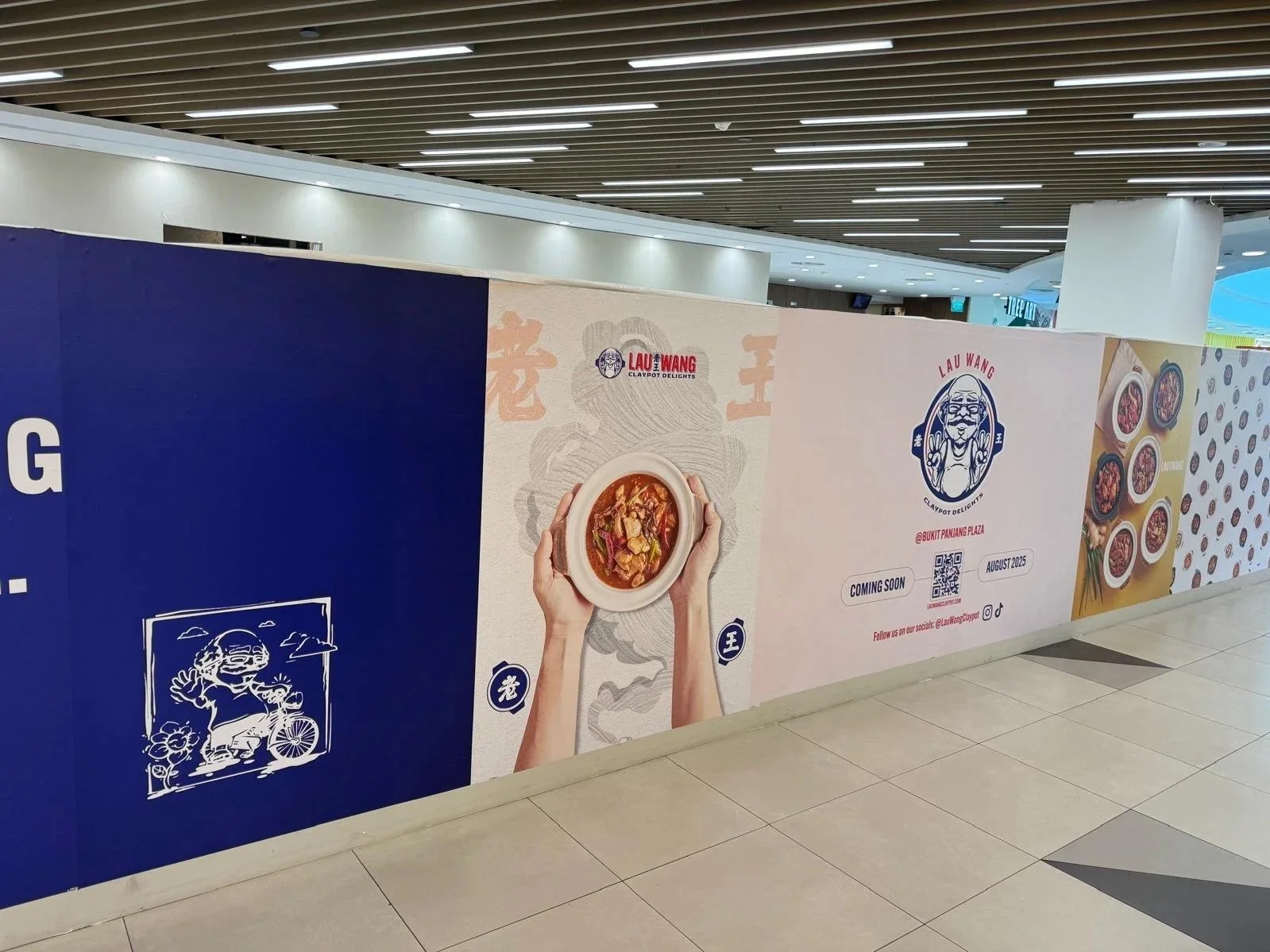 Advertisement banner for Lau Wang Claypot Delights restaurant at Bukit Panjang Plaza, showing a bowl of spicy noodle soup, the restaurant's logo, a QR code, and images of various dishes.