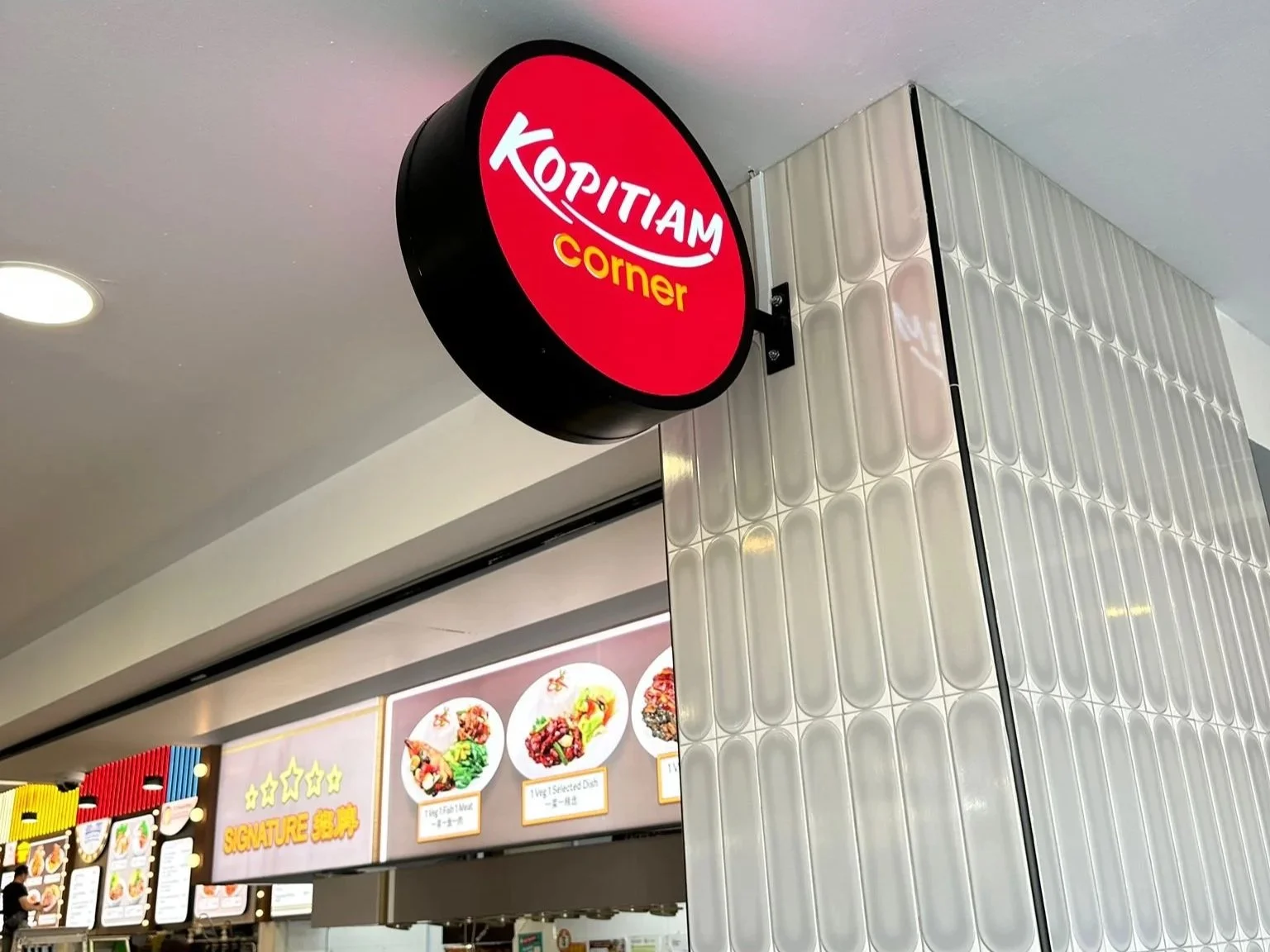 Sign for Kopitiam Corner at a food court or mall
