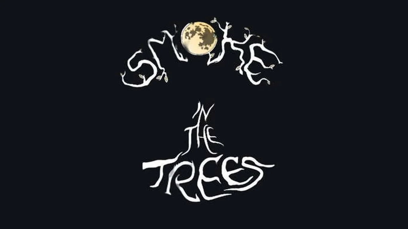 An artistic design featuring a full moon at the top, with tree branches forming the shape of the words 'SIT IN THE TREES' against a black background.