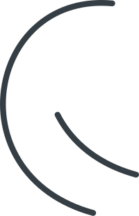 Close-up of a stylized black letter C on a dark background