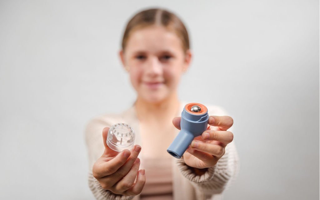 A teenage girl holds Vento