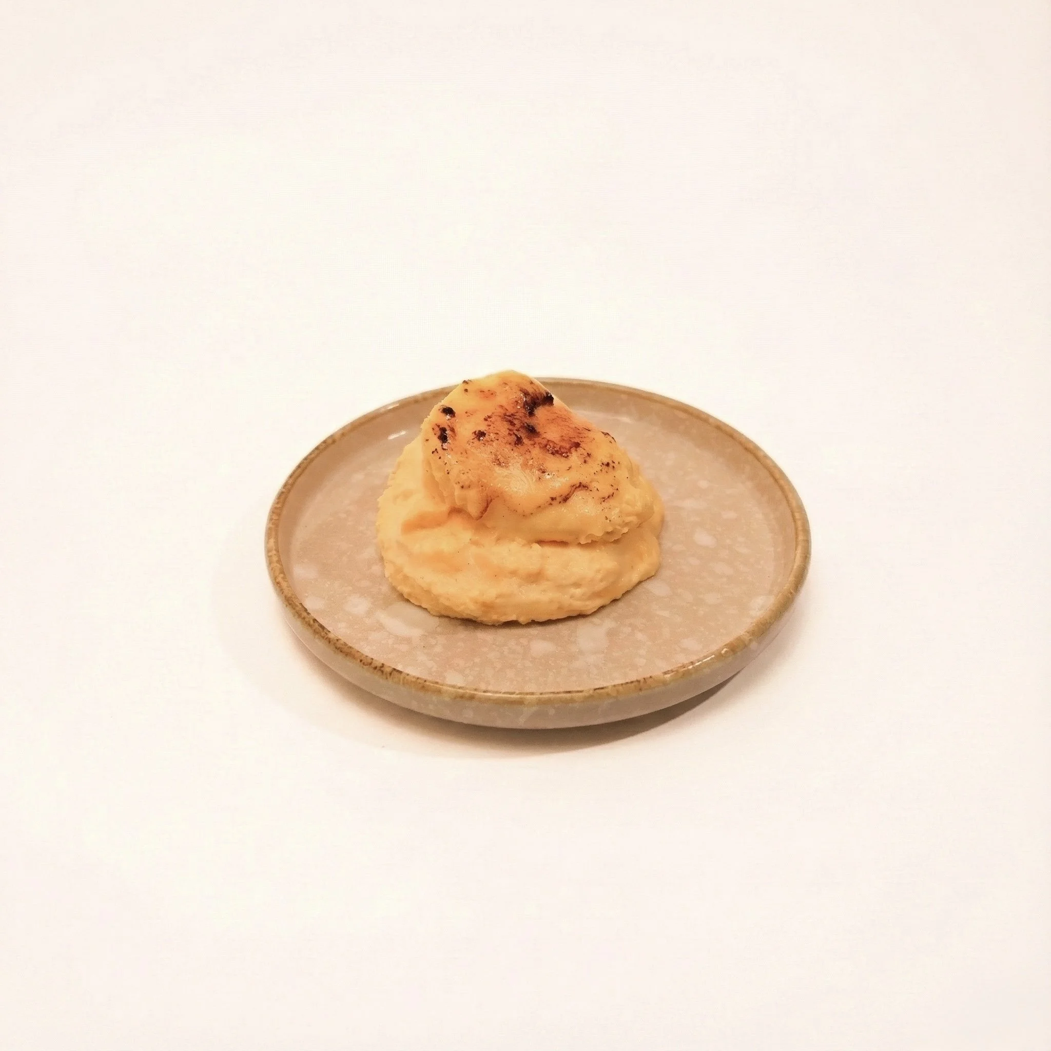 ROLLED BASQUE CHEESECAKE · A silky smooth basque cheesecake mousse rolled and torched · 240