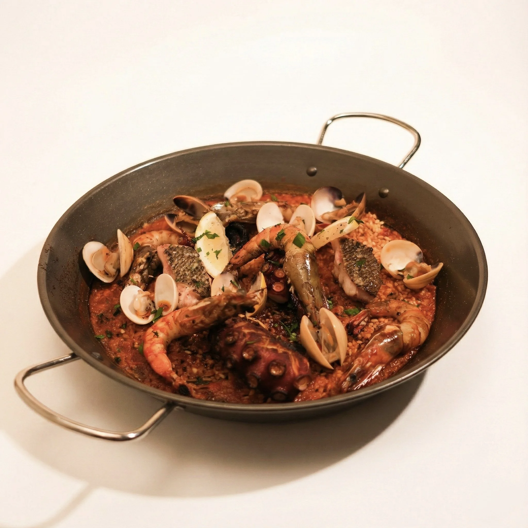 AL FRESCO PAELLA · A fuller, richer, signature take with daily catch, tiger prawns, clams, octopus and more · 1950