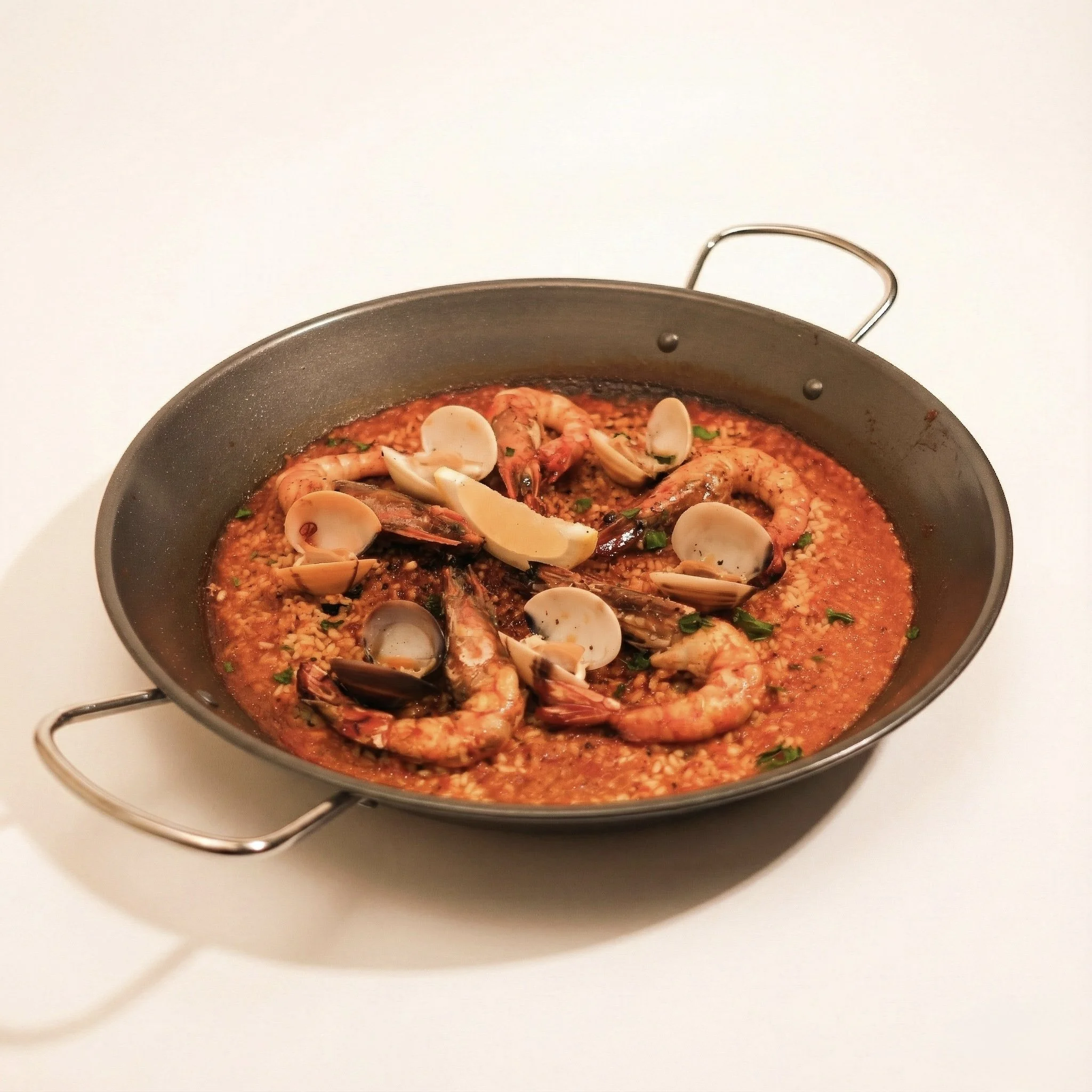 CLASSIC PAELLA · Your familiar pan of seasoned rice with essential seafood and aromatics · 1200