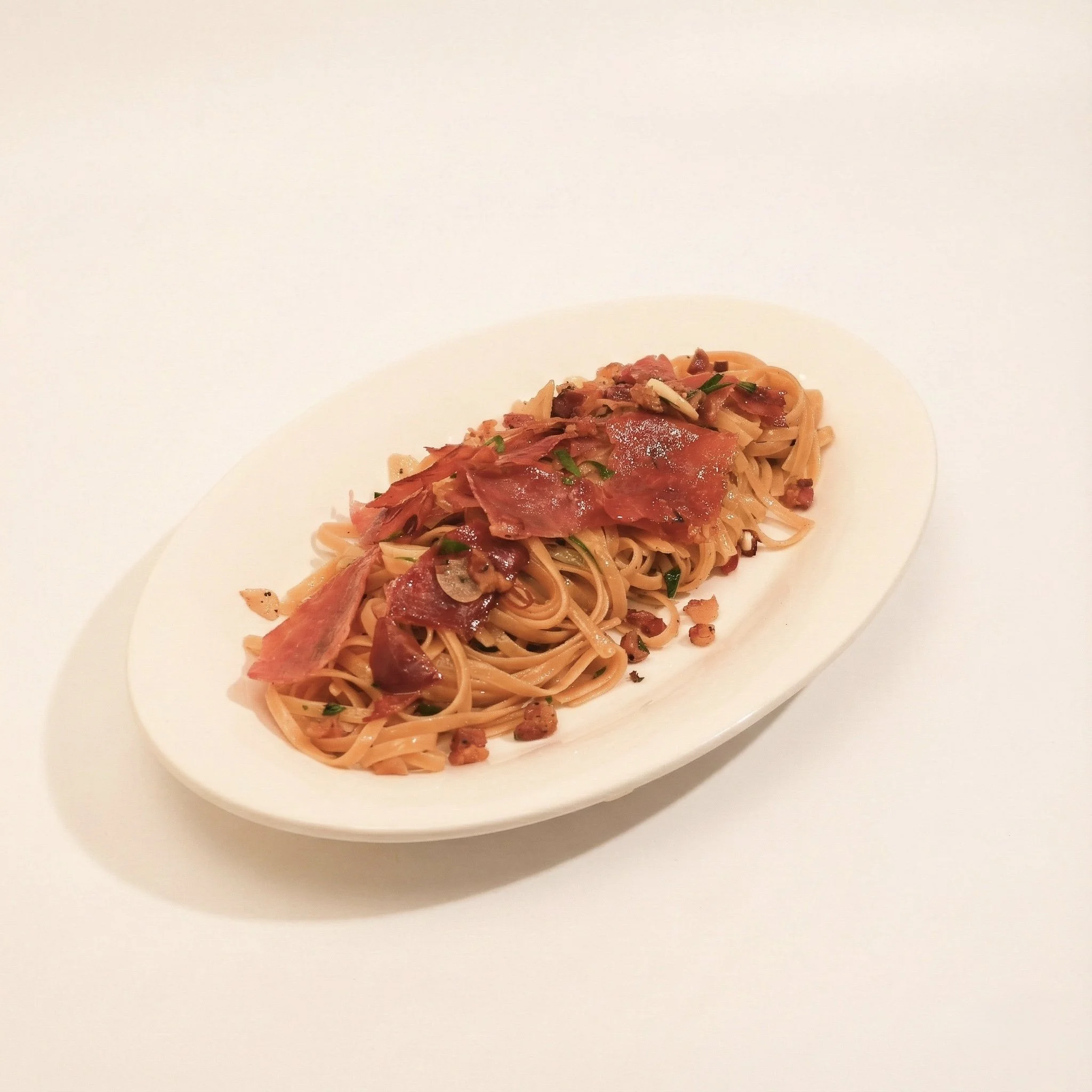 CHILI AGLIO & CRISPED SERRANO · Spaghetti with garlic, chili, and crisped ham · 390