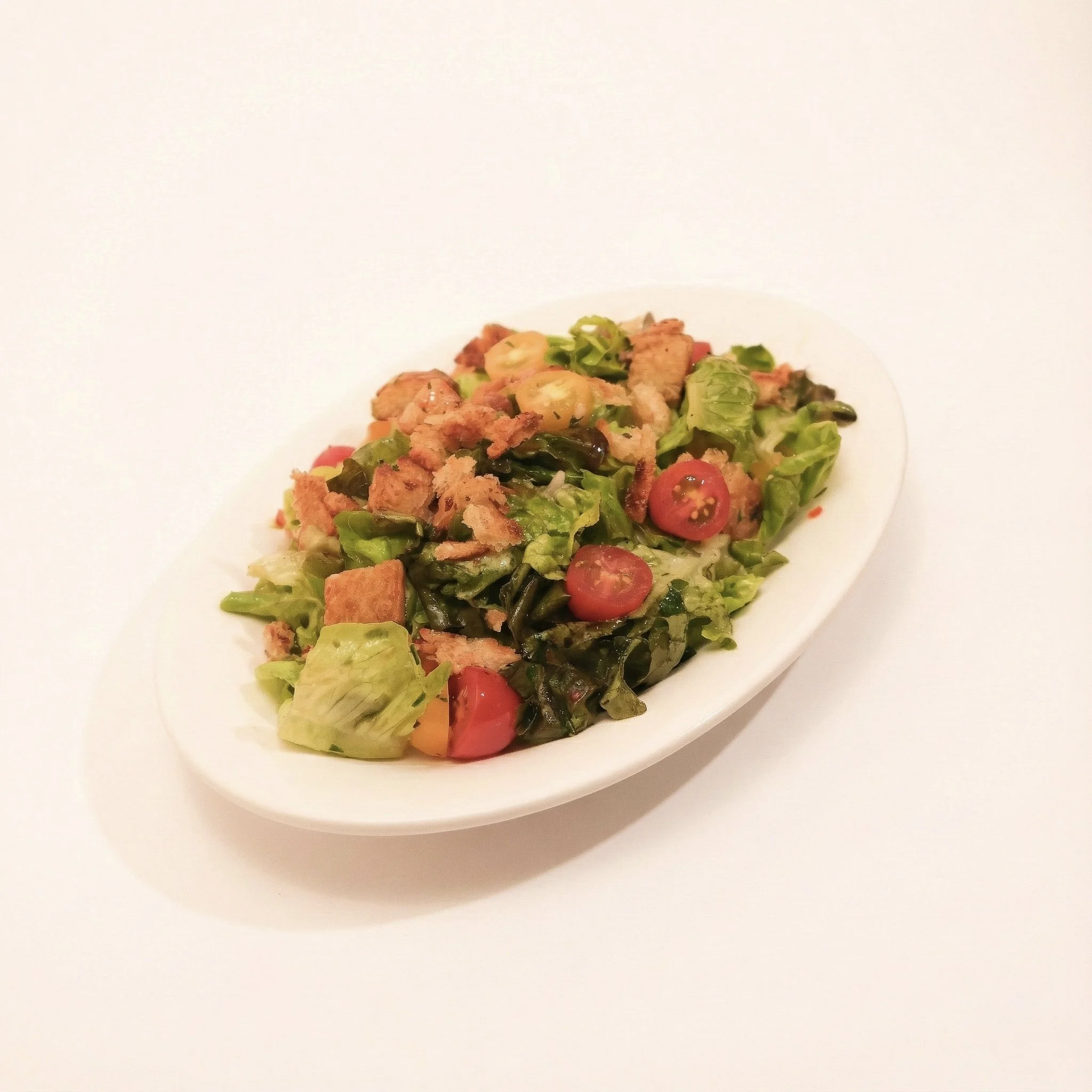 HOUSE GARDEN SALAD · Crisp seasonal greens with tomato, onion, and a chimichurri dressing · 290