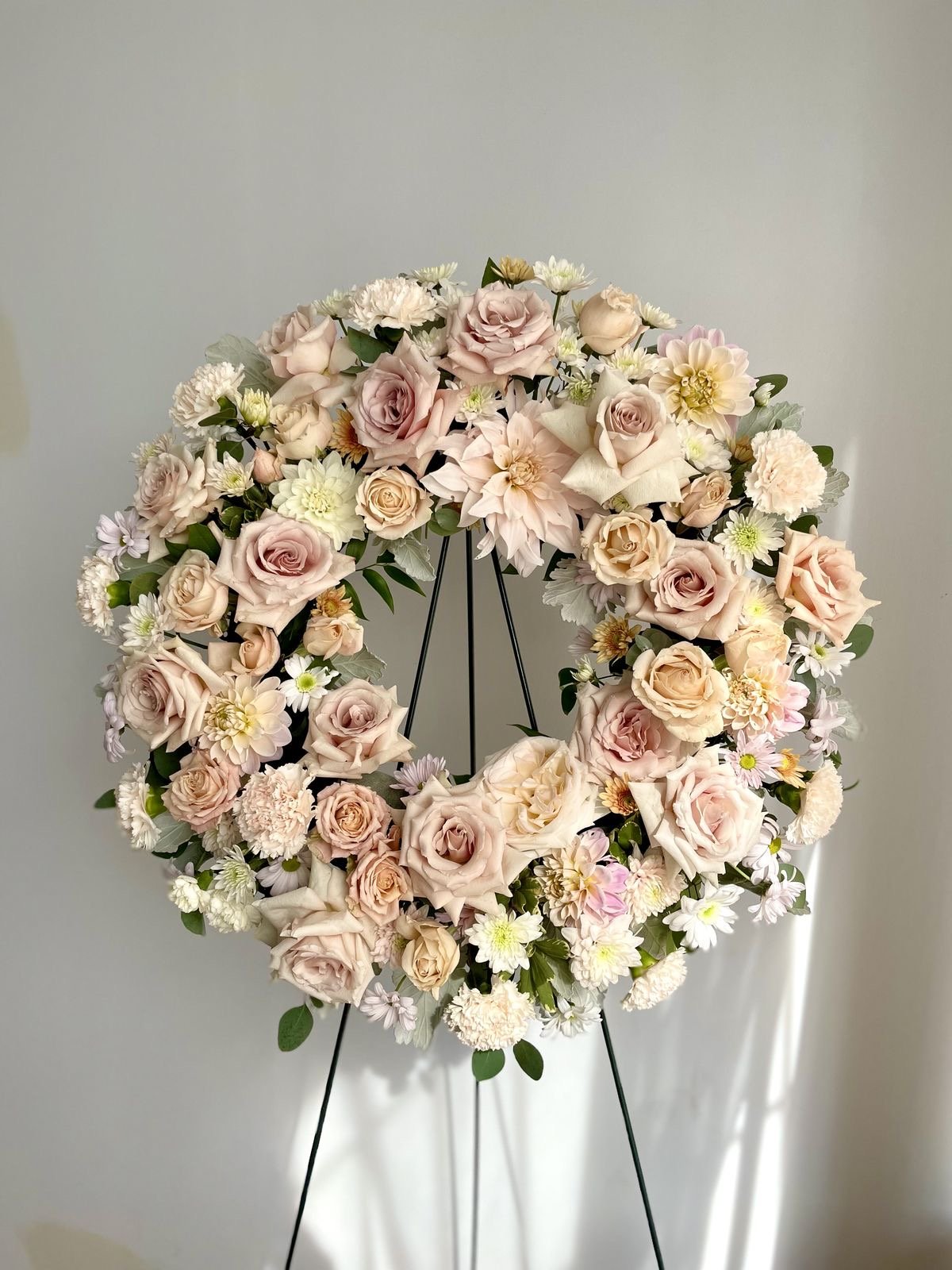 Funeral spray wreath blush and peach flowers