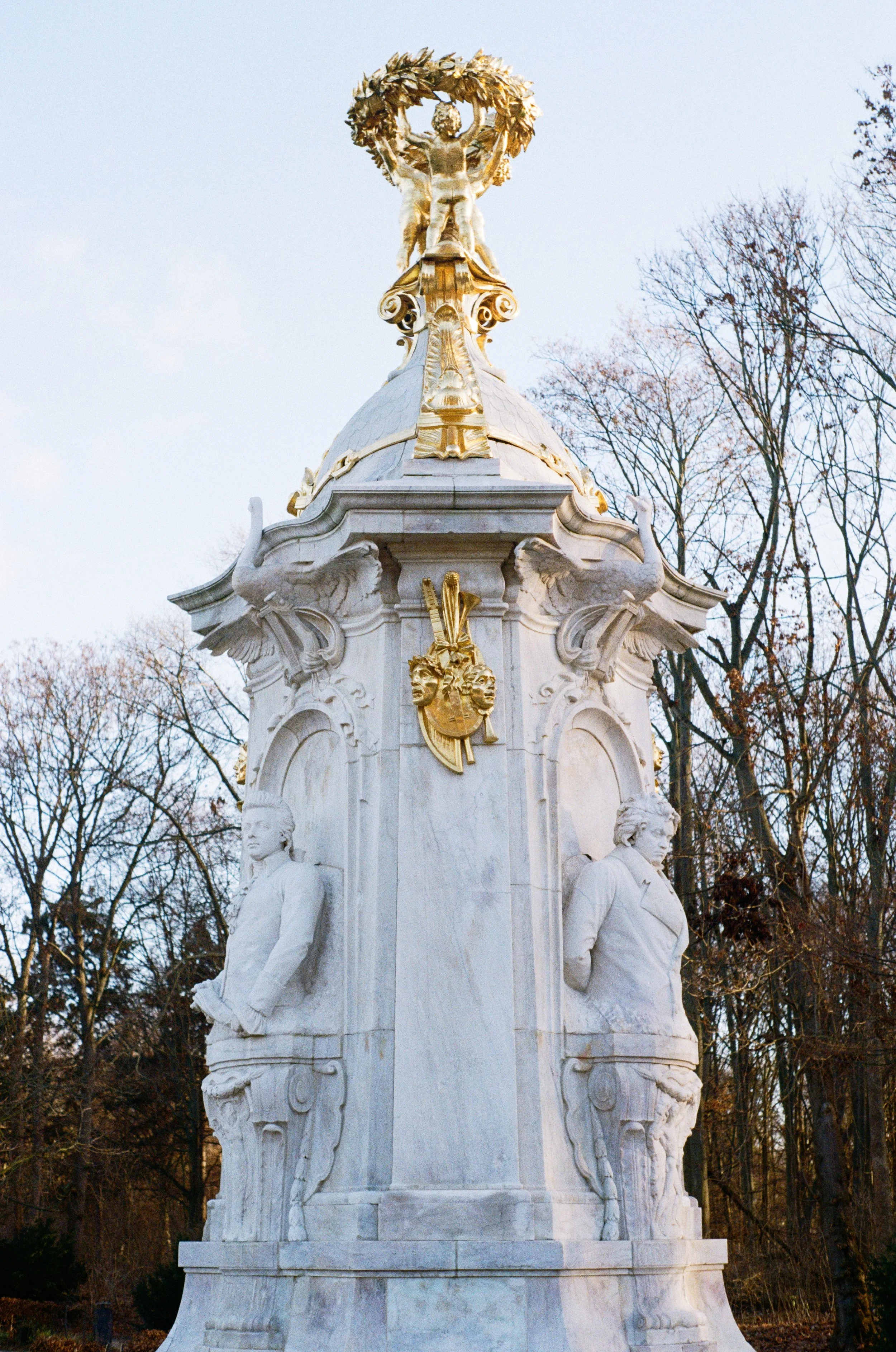 The Beethoven–Haydn–Mozart Memorial, marble white with bright gold decorations adorning the top