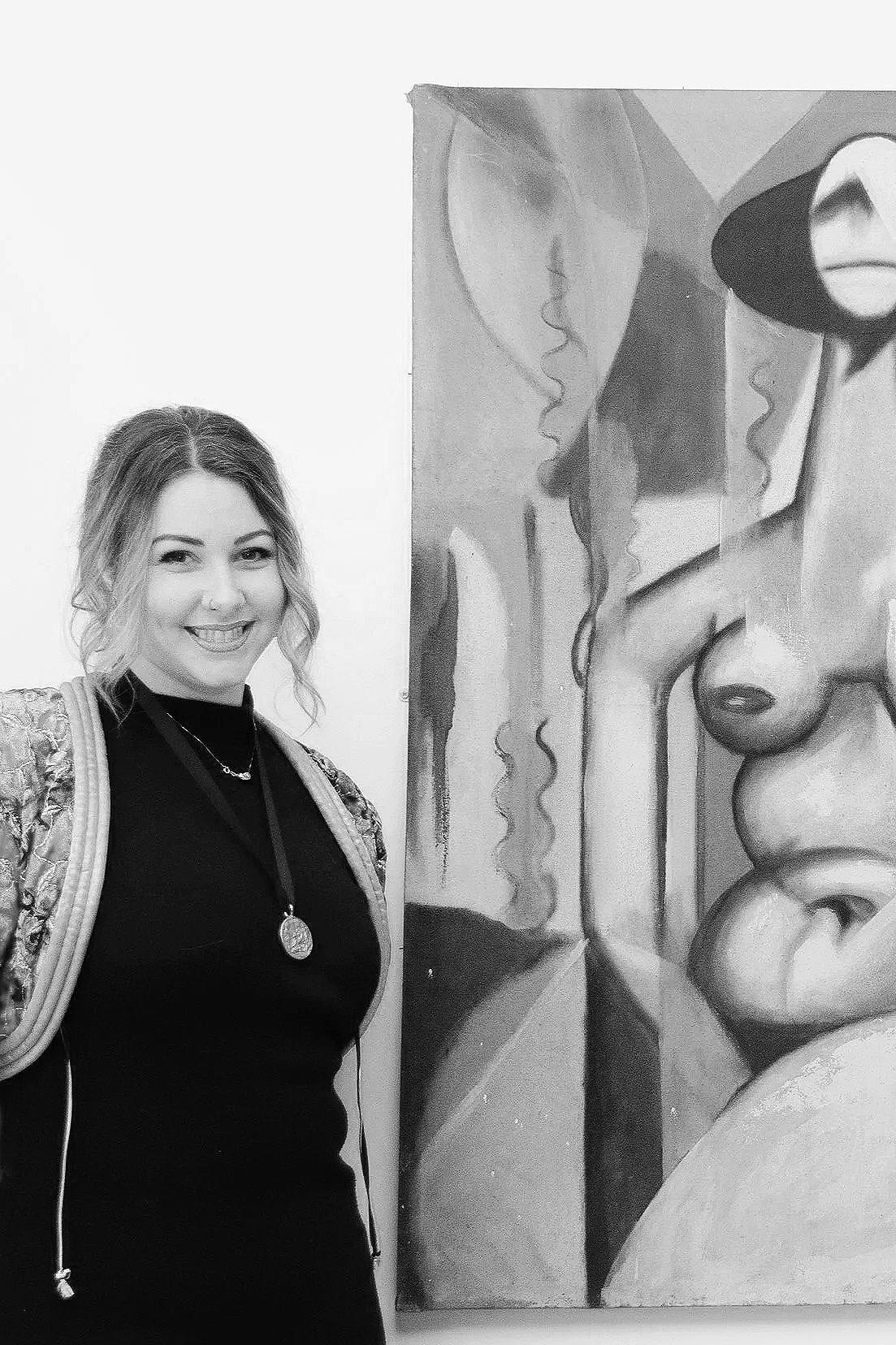 Portrait of Abbie Griffiths, Founder and Creative Director, practising artist and art professional with international exhibition and curation experience.