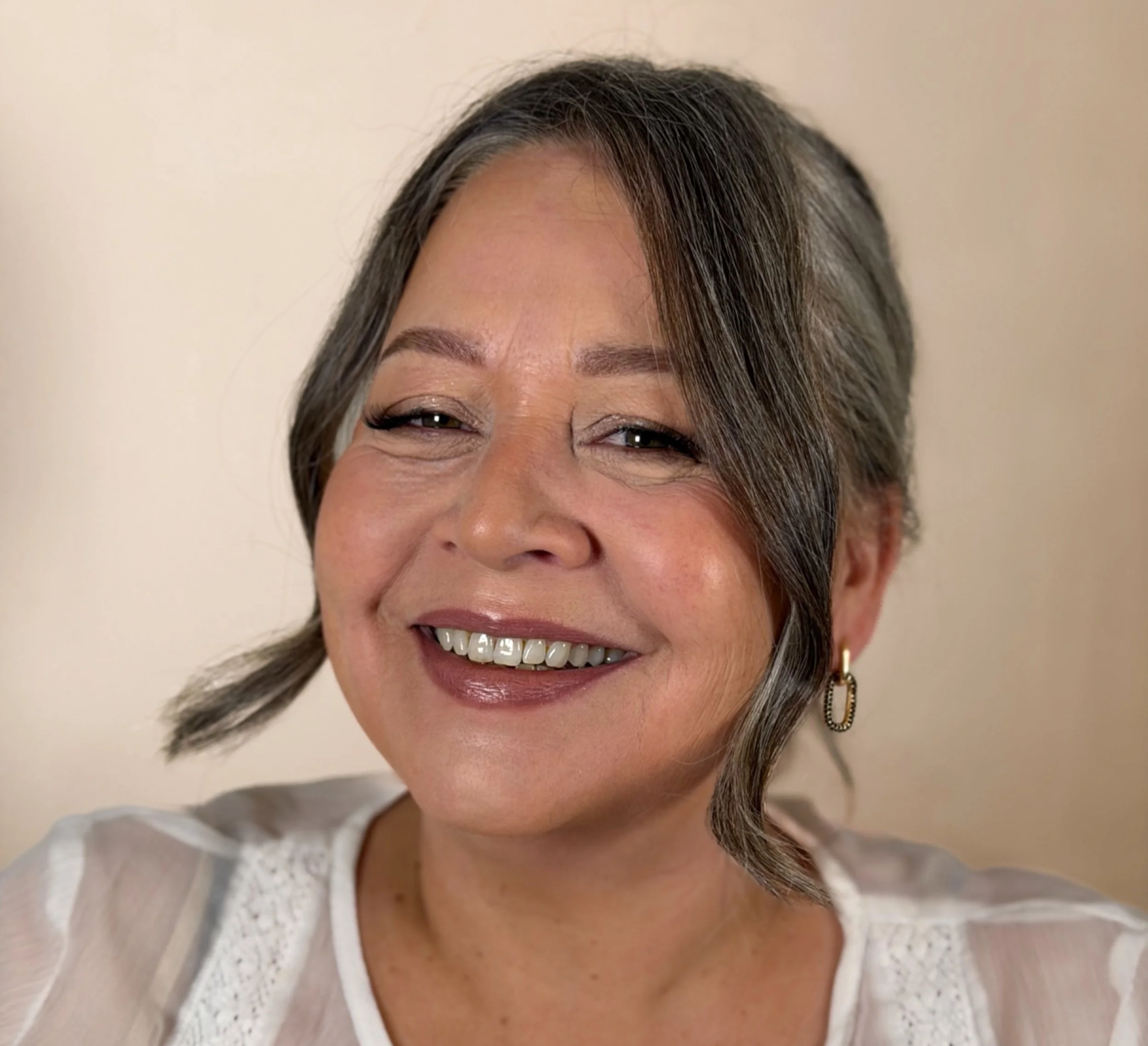 Elegant, soft bridal makeup on mature skin by professional makeup artist Eva Imeliana.