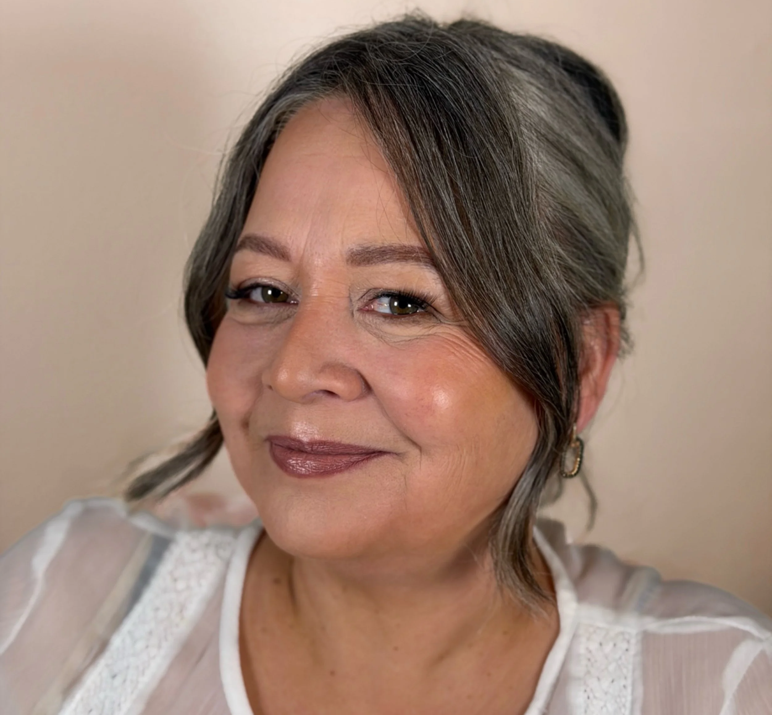 Timeless mother of the bride makeup look on mature skin with soft definition and glow.