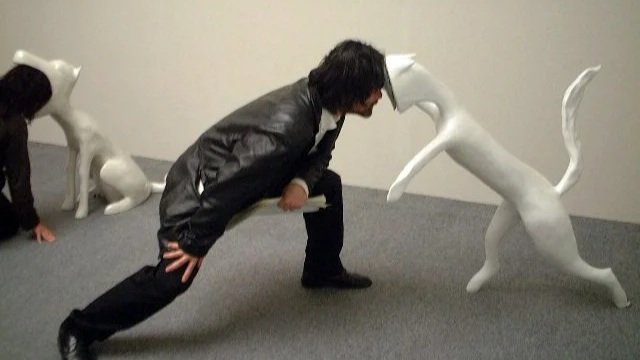 面對面 Face to Face" / fiber glass, LCD monitors, VCD players and speakers, various size / 2001