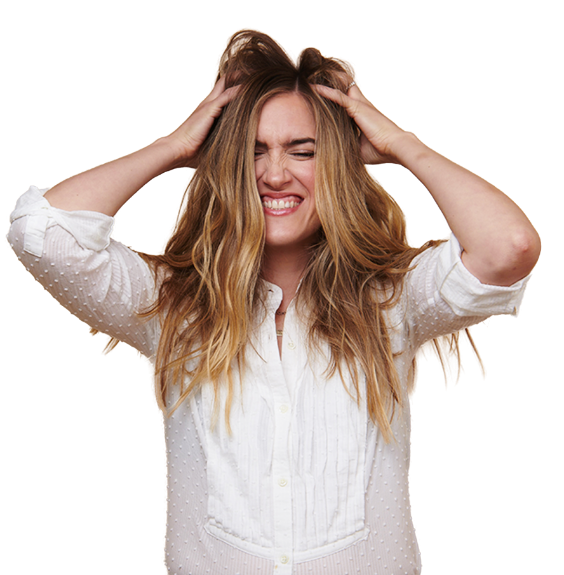Frustrated woman holding her head with both hands, eyes closed, smiling and teeth clenched