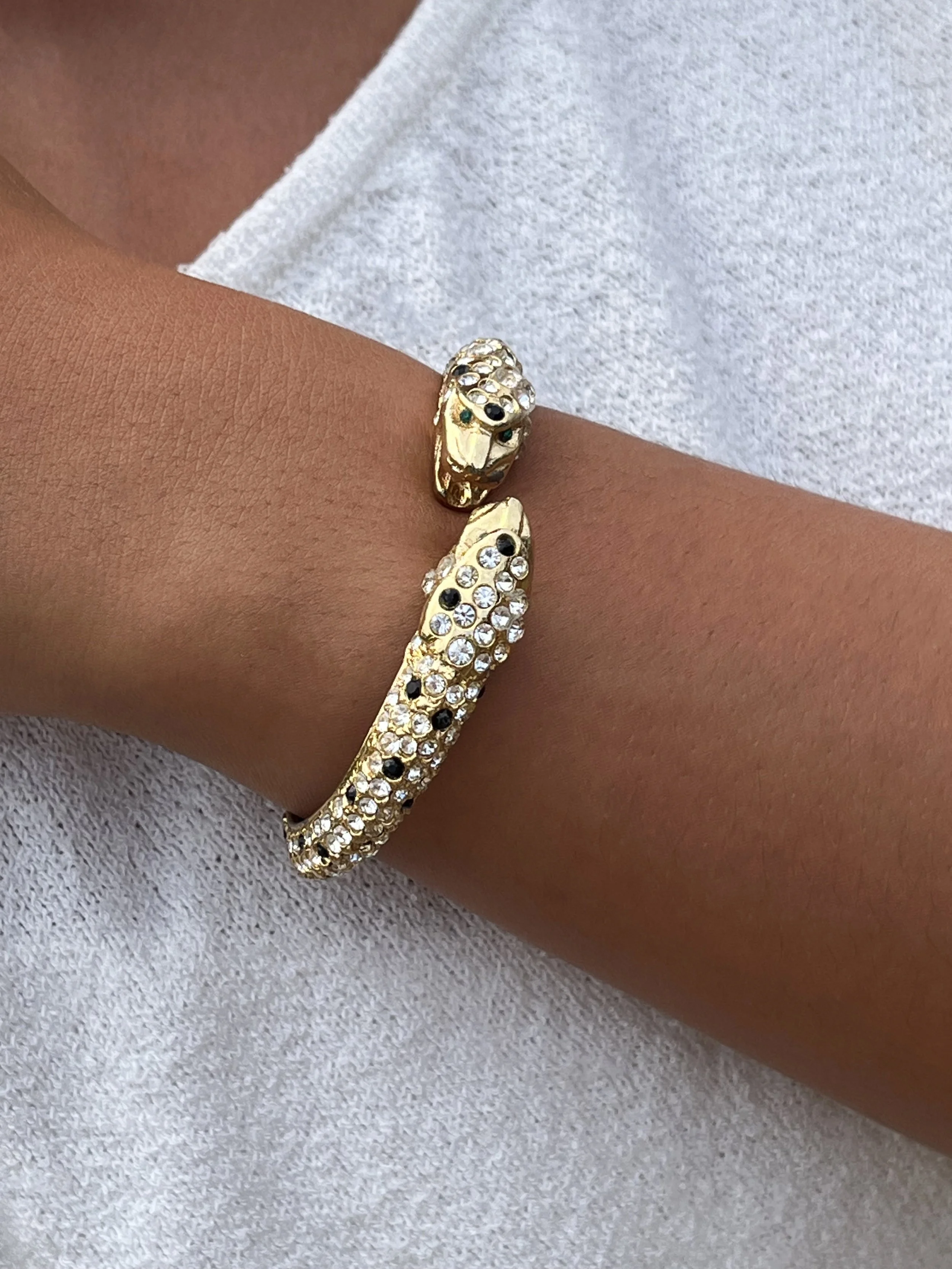 1960s KENNETH JAY LANE DOUBLE LEOPARD BANGLE ON MODEL.jpeg