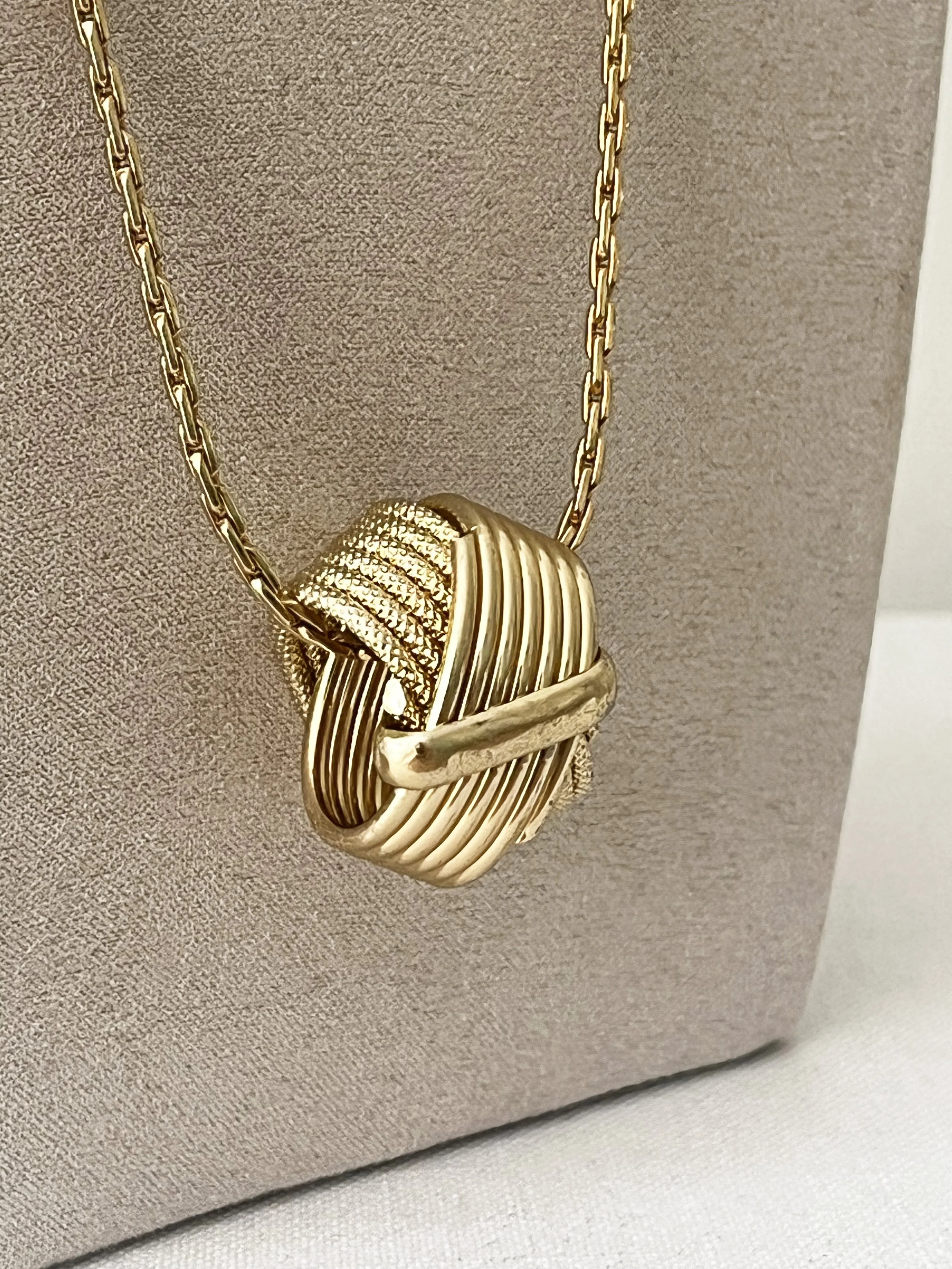 Sarah Coventry Gold Knot Pendant