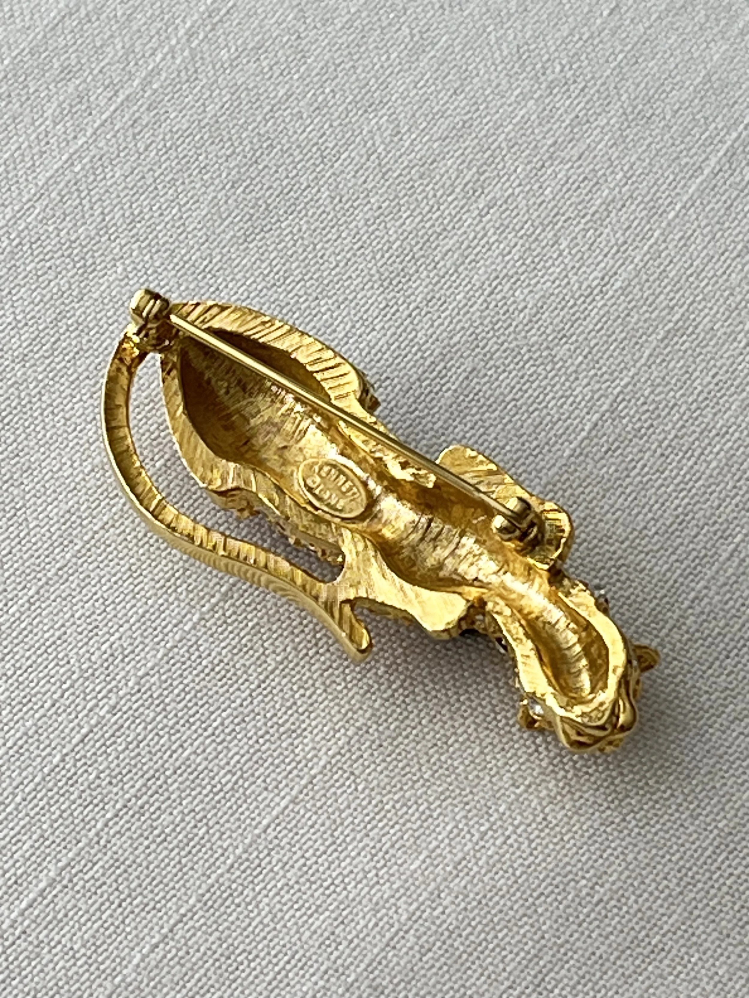 1990s VINTAGE KENNETH JAY LANE CRYSTAL PROWLING PANTHER BROOCH REVERSE.jpg