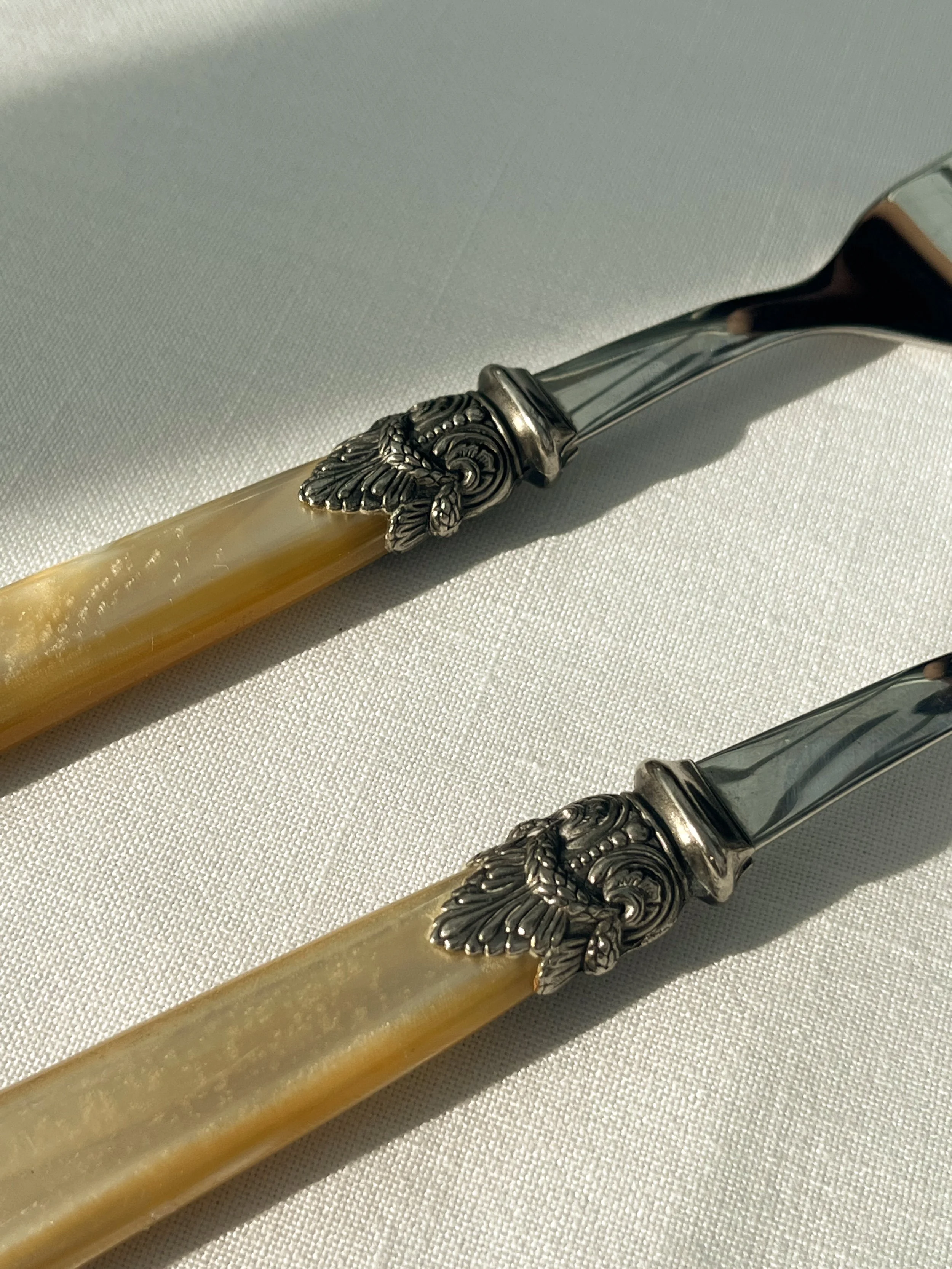 1990s PEARLESCENT SALAD SERVERS DETAIL.jpeg