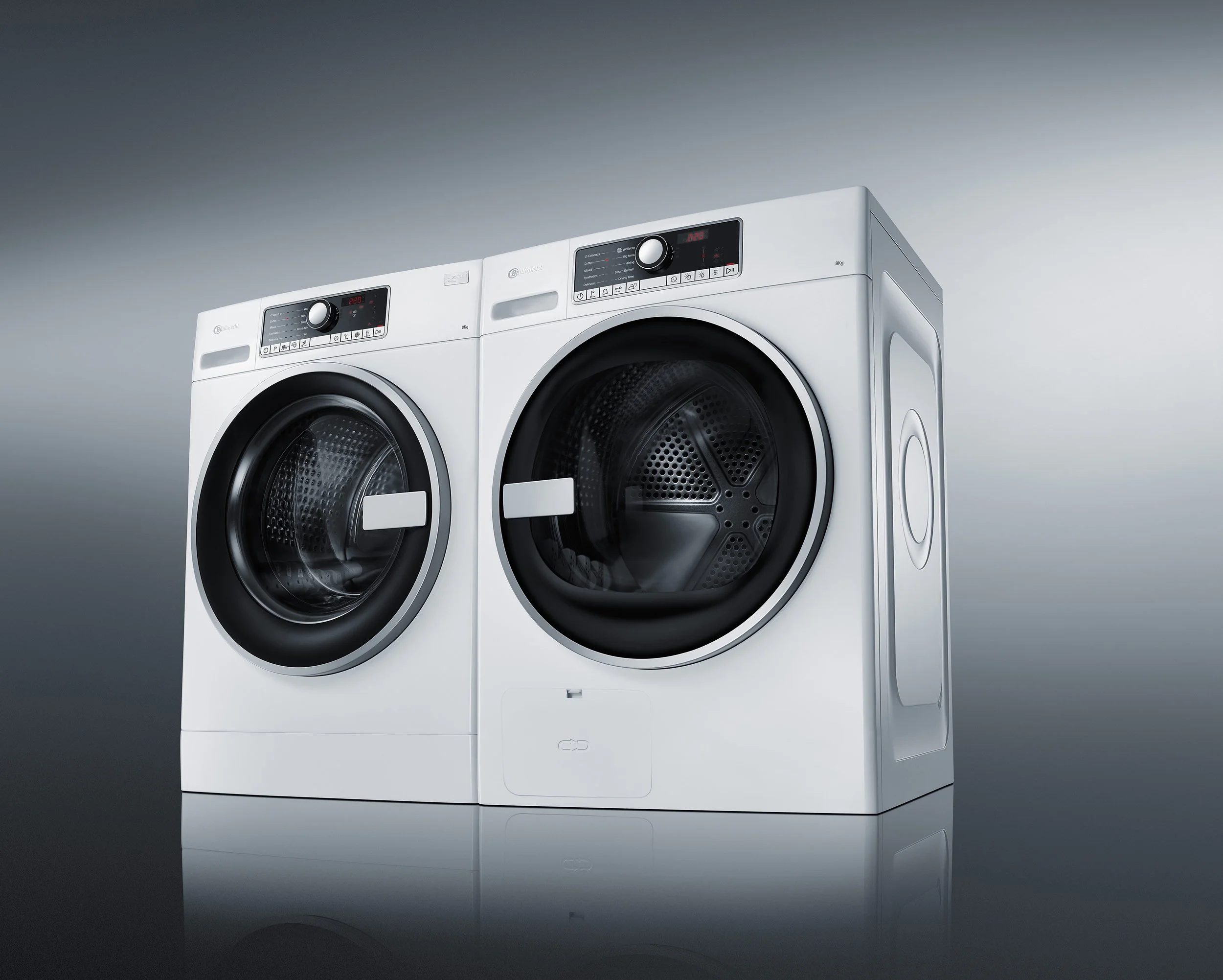 Zwei moderne Waschmaschinen vor einem grauen Hintergrund.