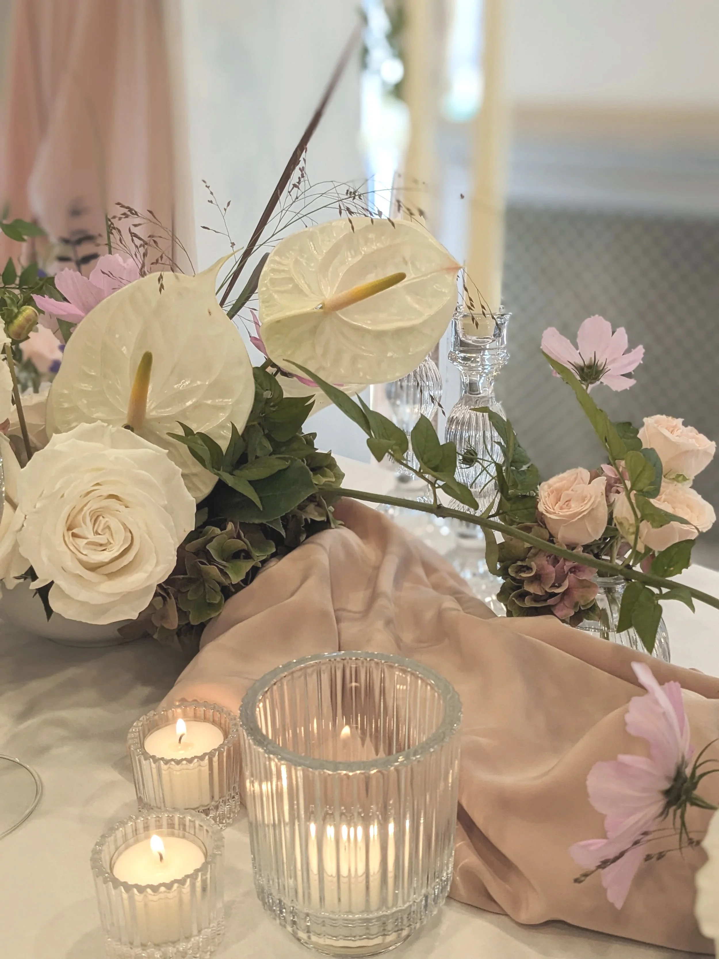 Wedding top table white and pink flowers and candles