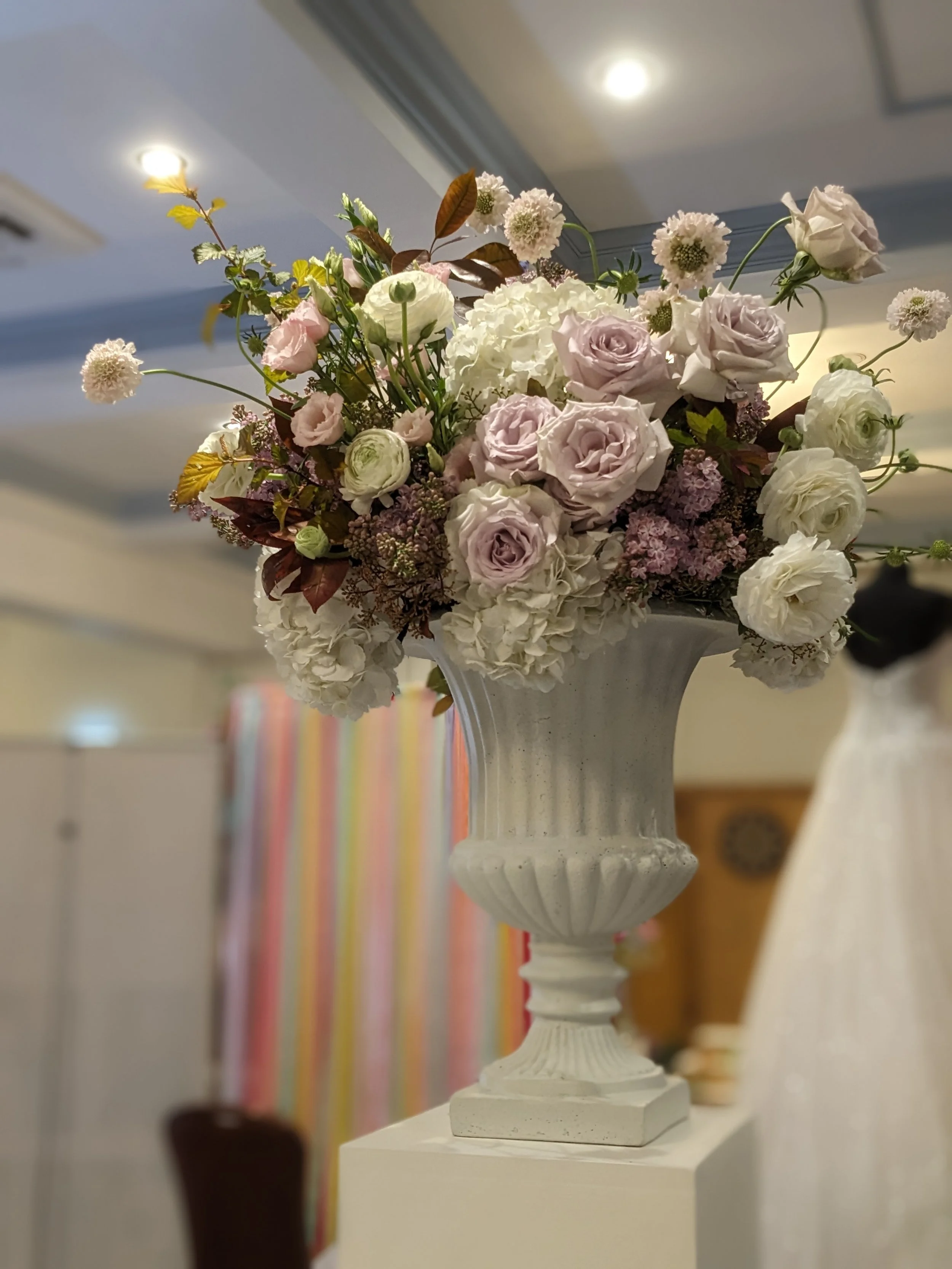 Lilac and white flower urn
