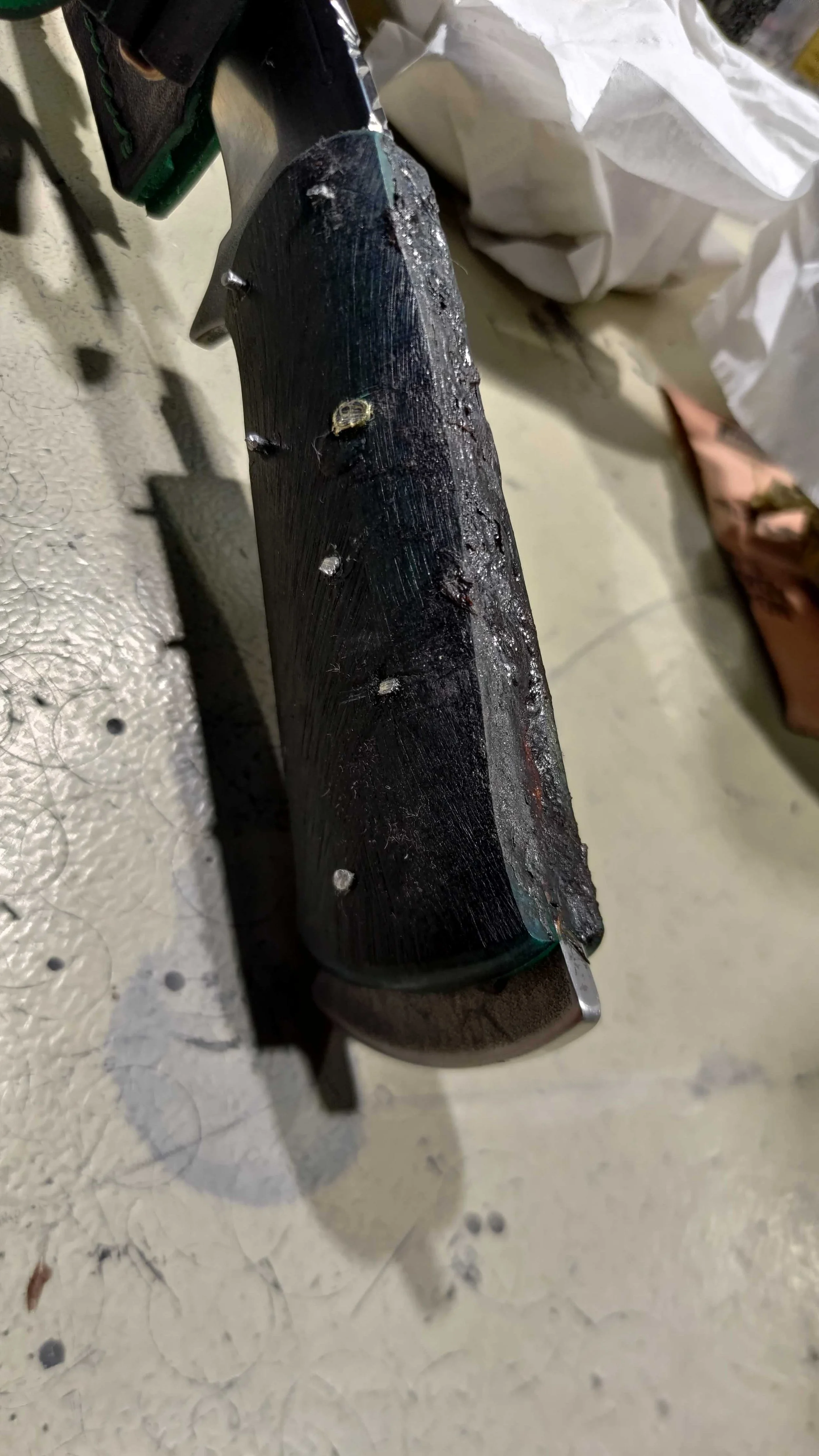 The block after clamping and before shaping with the belt sander