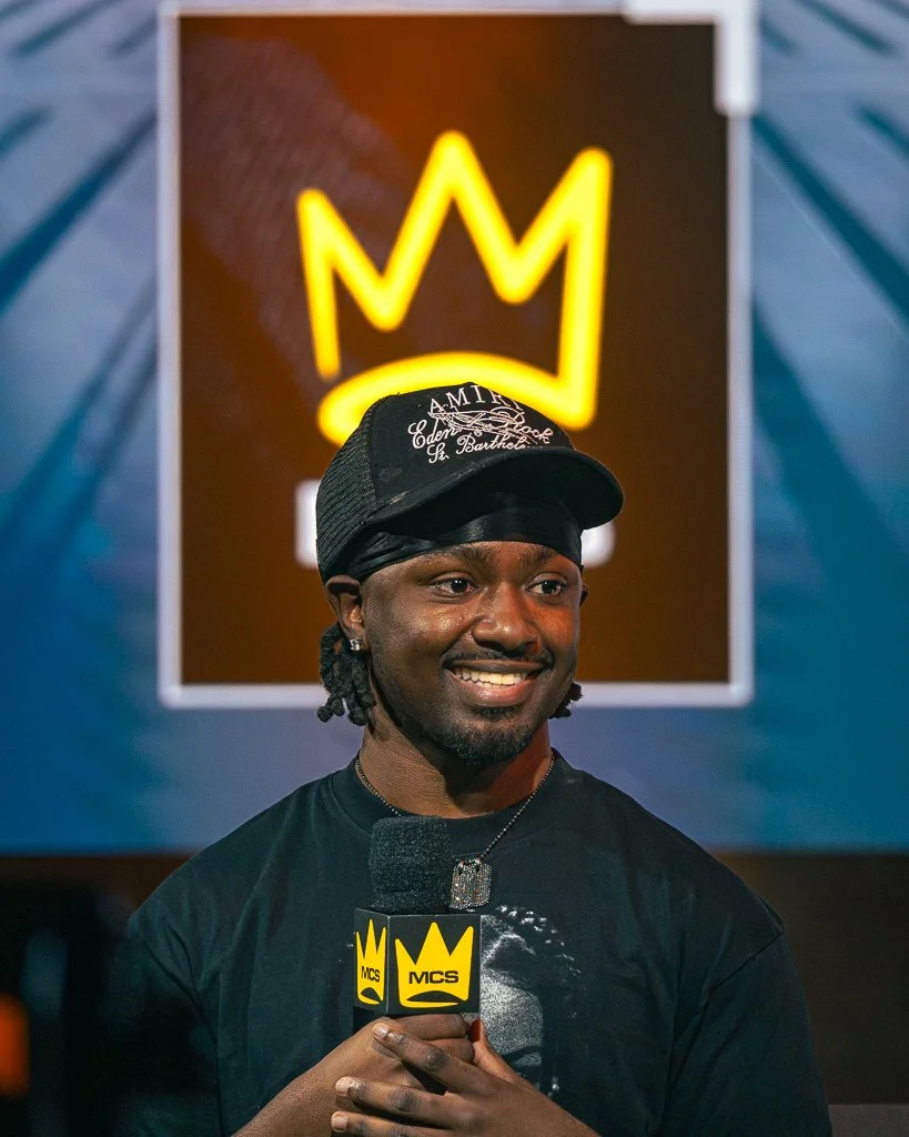 Henry Leverette professional Madden player smiling during Madden Most Feared 2026. A crown highlights him.