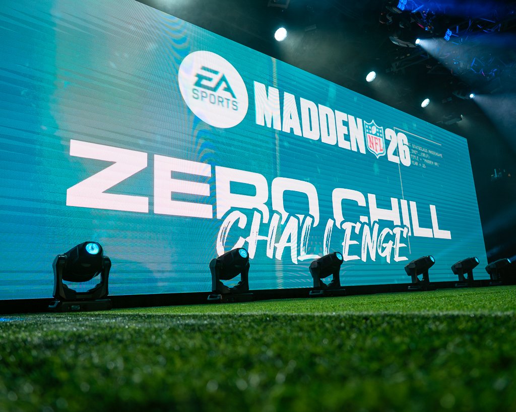 Large LED screen displaying the Madden NFL 26 Zero Chill Challenge logo with stage lights and spotlights in the background.