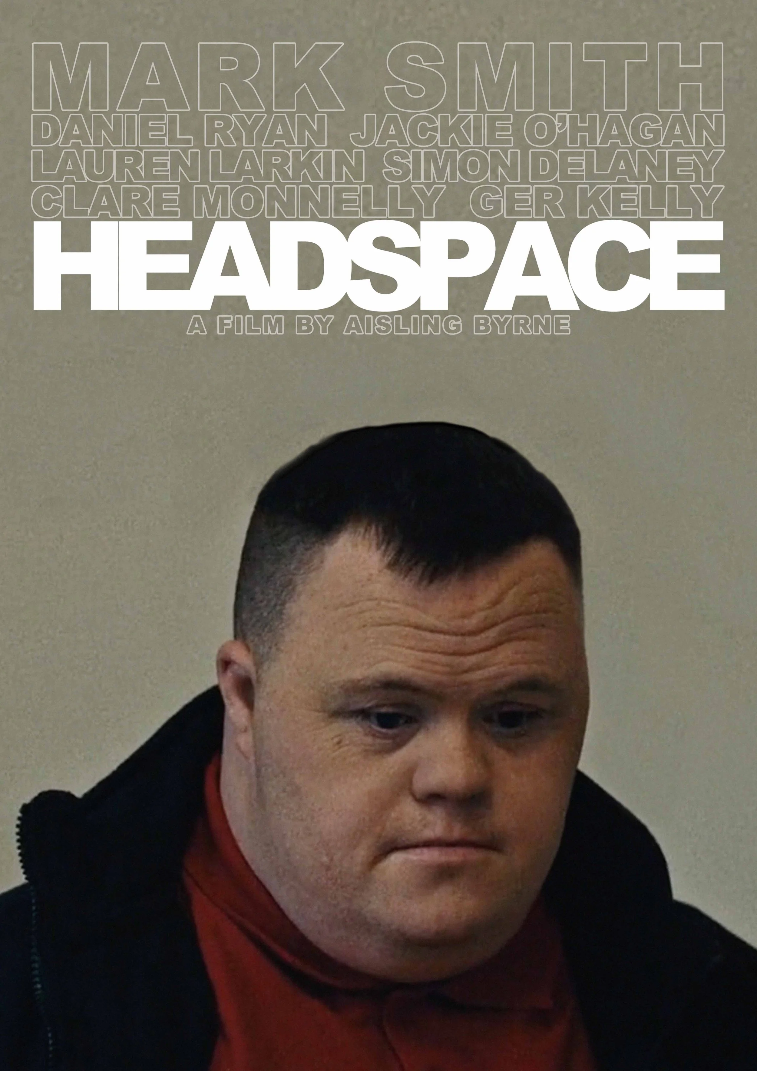 Poster for the film 'Headspace' by Aisling Byrne, showing a close-up of a young man with short dark hair, wearing a red shirt and black jacket, looking downward.