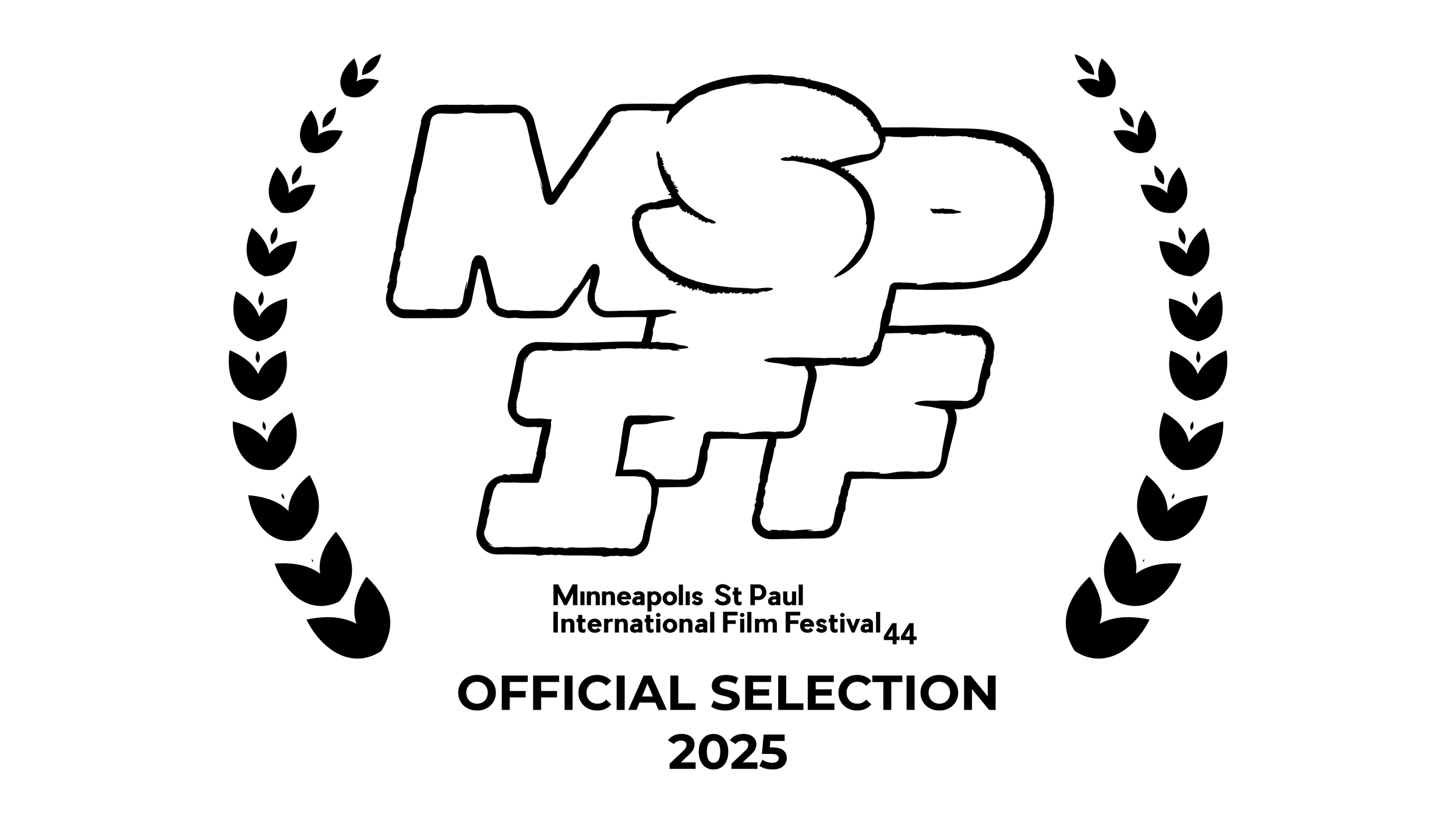 A close-up view of a rope knot tied to a metal hook, with a background of a rocky surface.