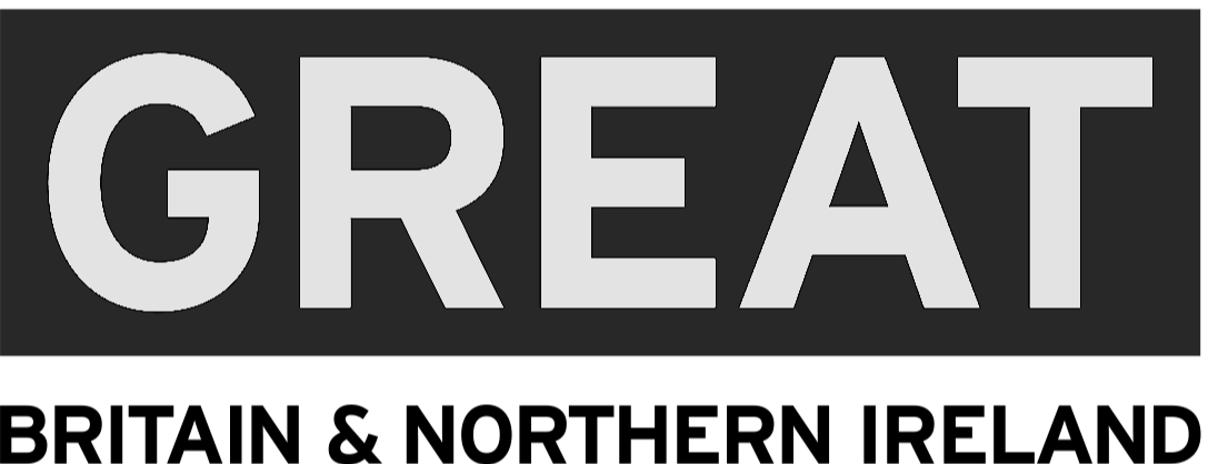 A black and gray sign with the word "GREAT" in bold, uppercase letters.