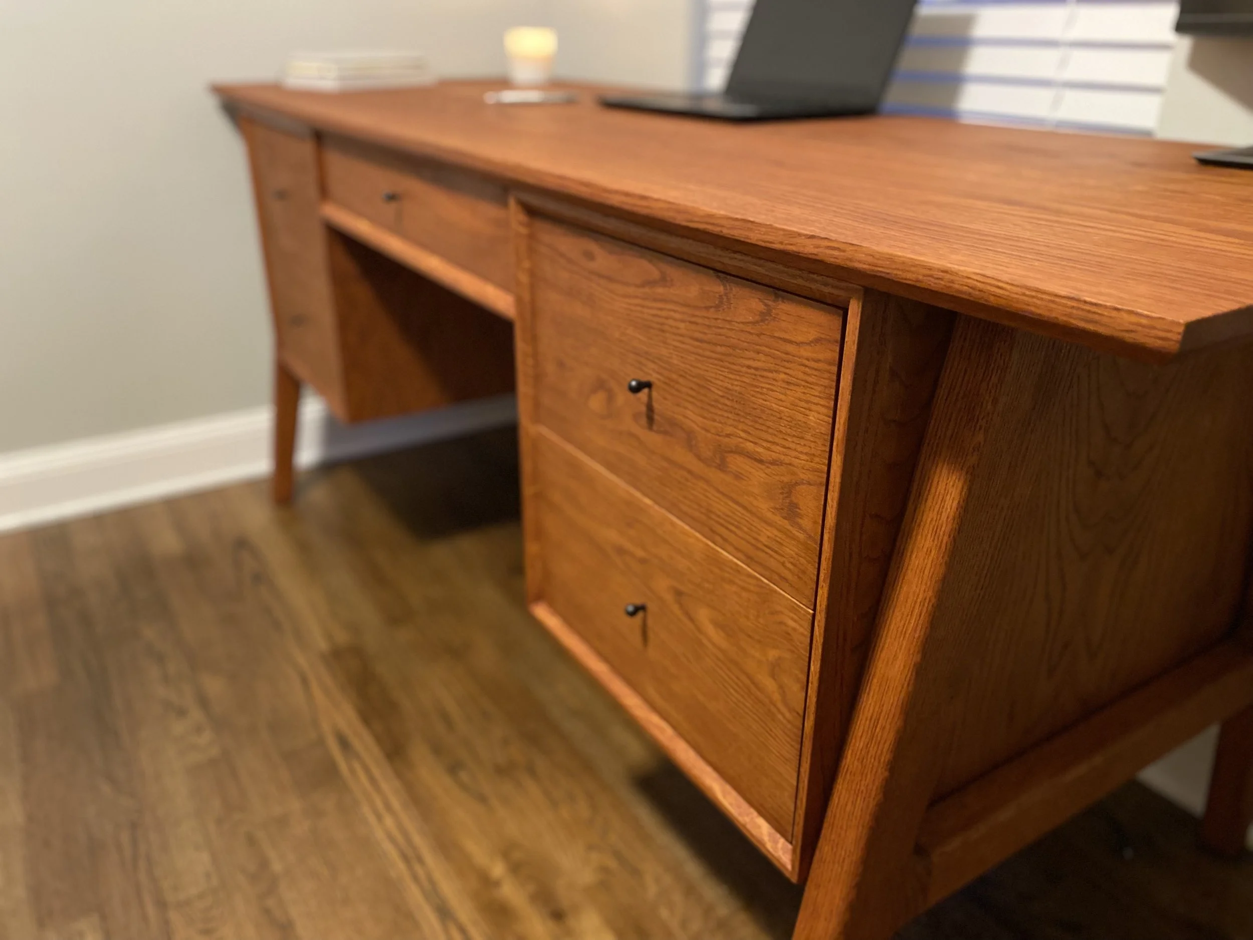 White oak executive desk with rich tone and flowing grain