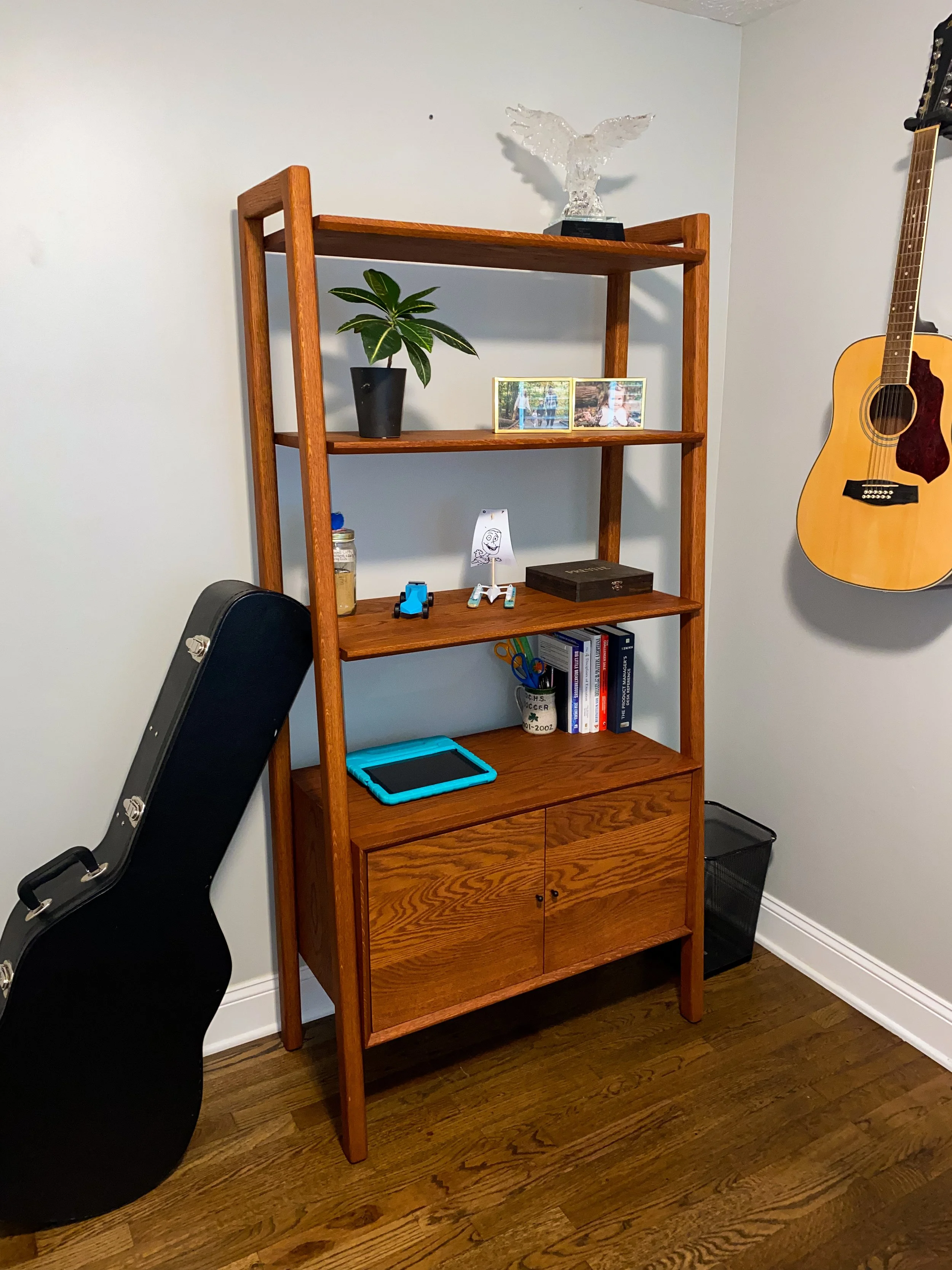 custom book shelf in white oak with guitars