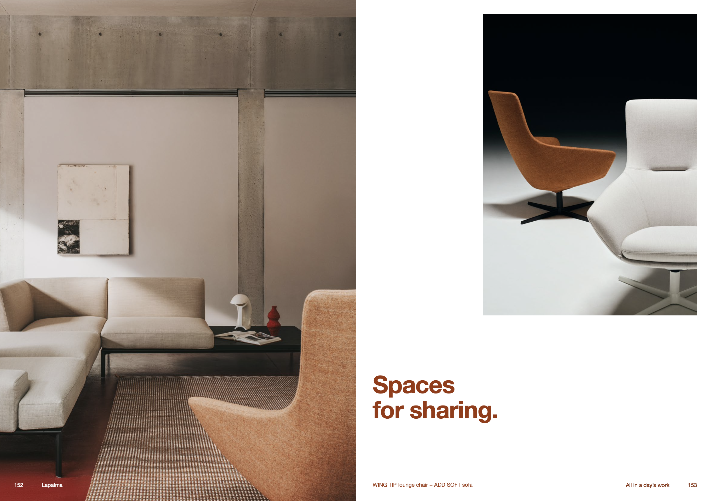 Interno di un salotto con divano beige, poltrona in tessuto arancione, tavolino nero con riviste e oggetti decorativi, pareti di cemento e un quadro astratto.