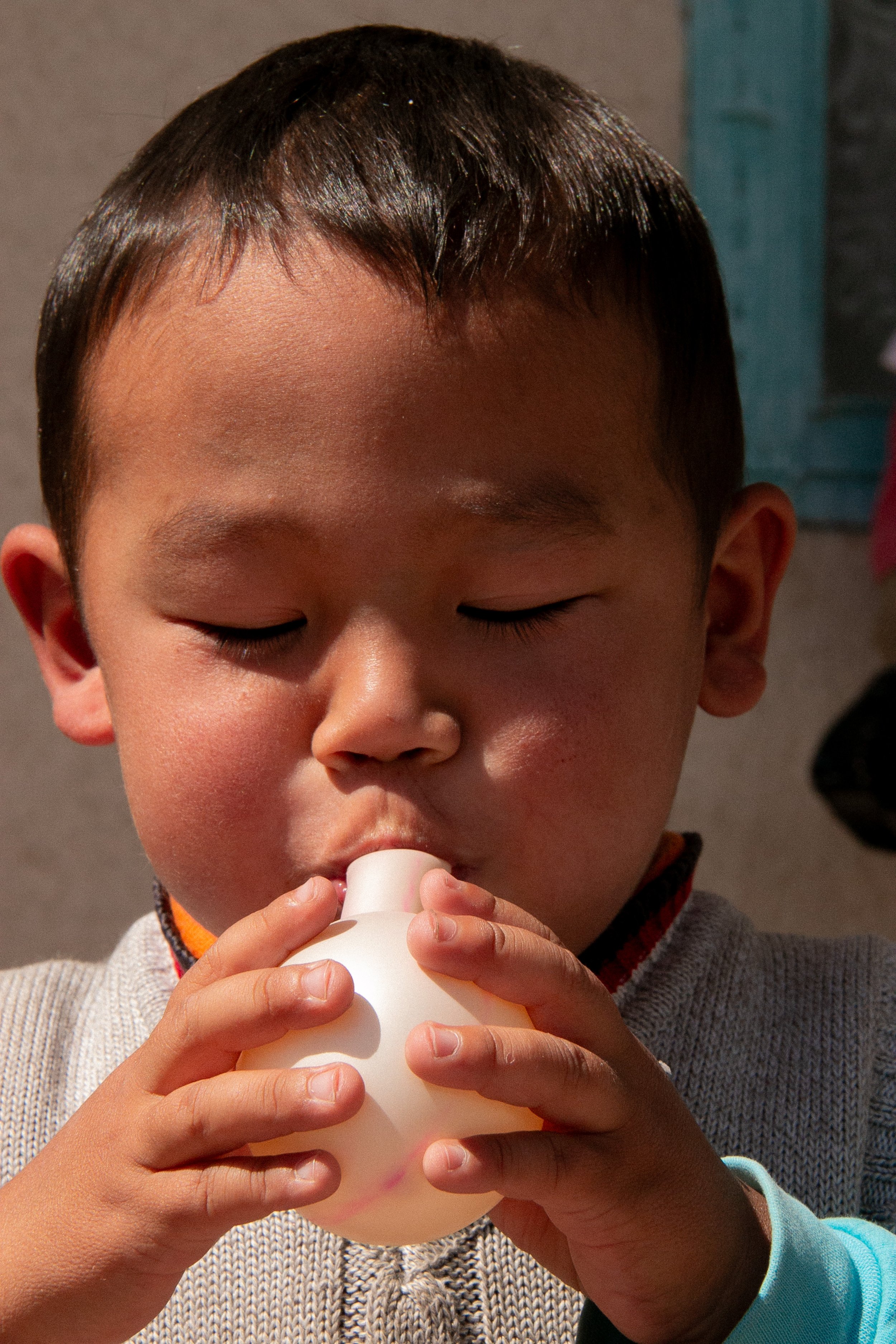 HG05 | boy drinking | kyrgyzstan | 2016