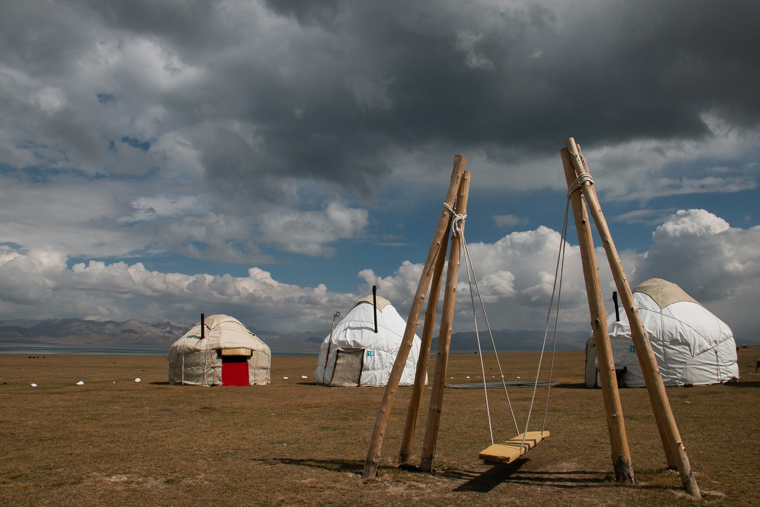 HG12 | yurts and swing on grassland |  kyrgyzstan | 2016
