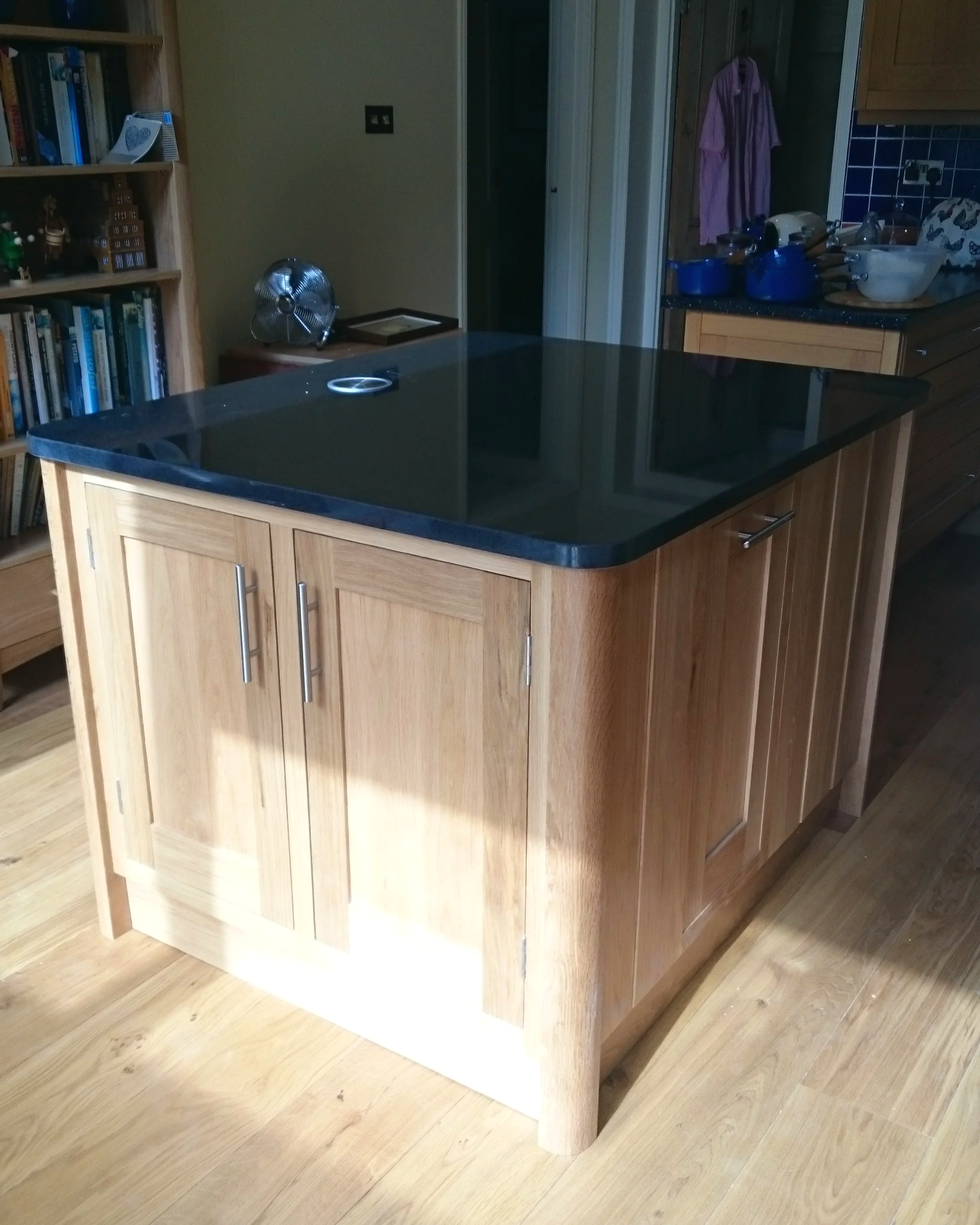 Oak island with black granite top