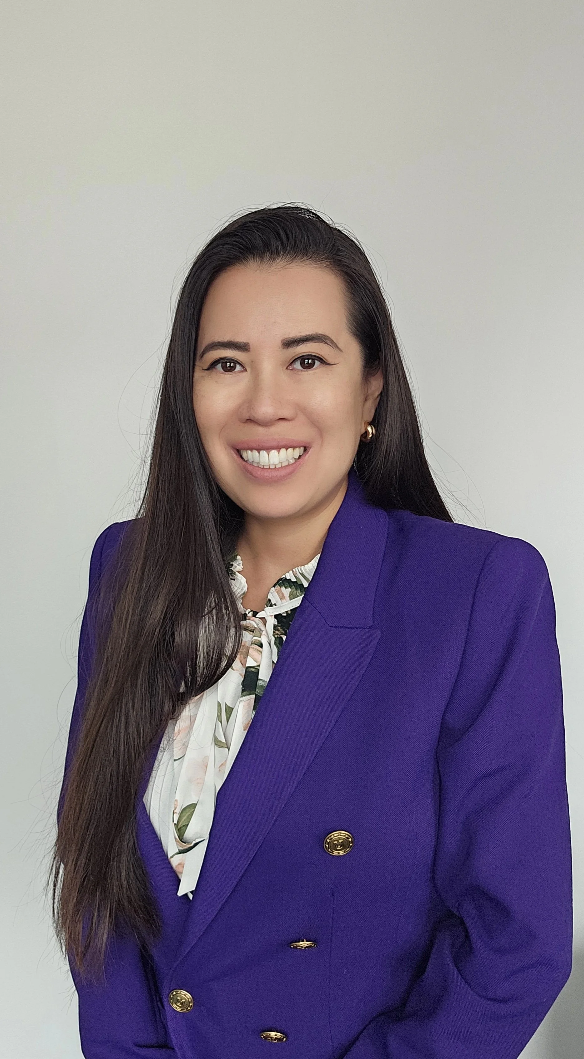 A minor woman who has succeeded in climbing the corporate ladder.