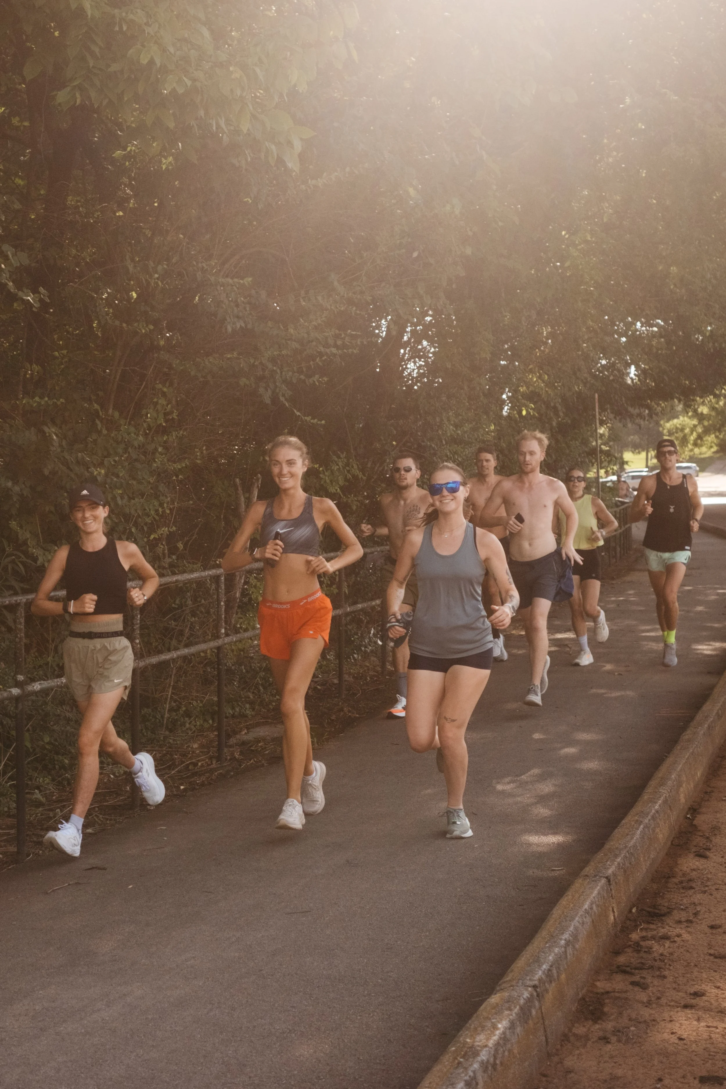 Runners participating in the Tuesday social run heading towards the track