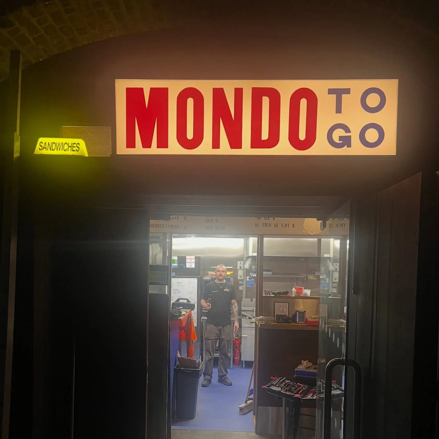 New Deptford boondoggle &ldquo;MONDO TO GO&rdquo; opens this Friday! Financially unsound 50% OFF opening offer all weekend! Sell outs PROBABLE! Sandwiches DEFINITELY! Sign BEAUTIFUL!

&ldquo;MONDO TO GO&rdquo; is open Weds-Sun, 10-4! 
Address is Arch