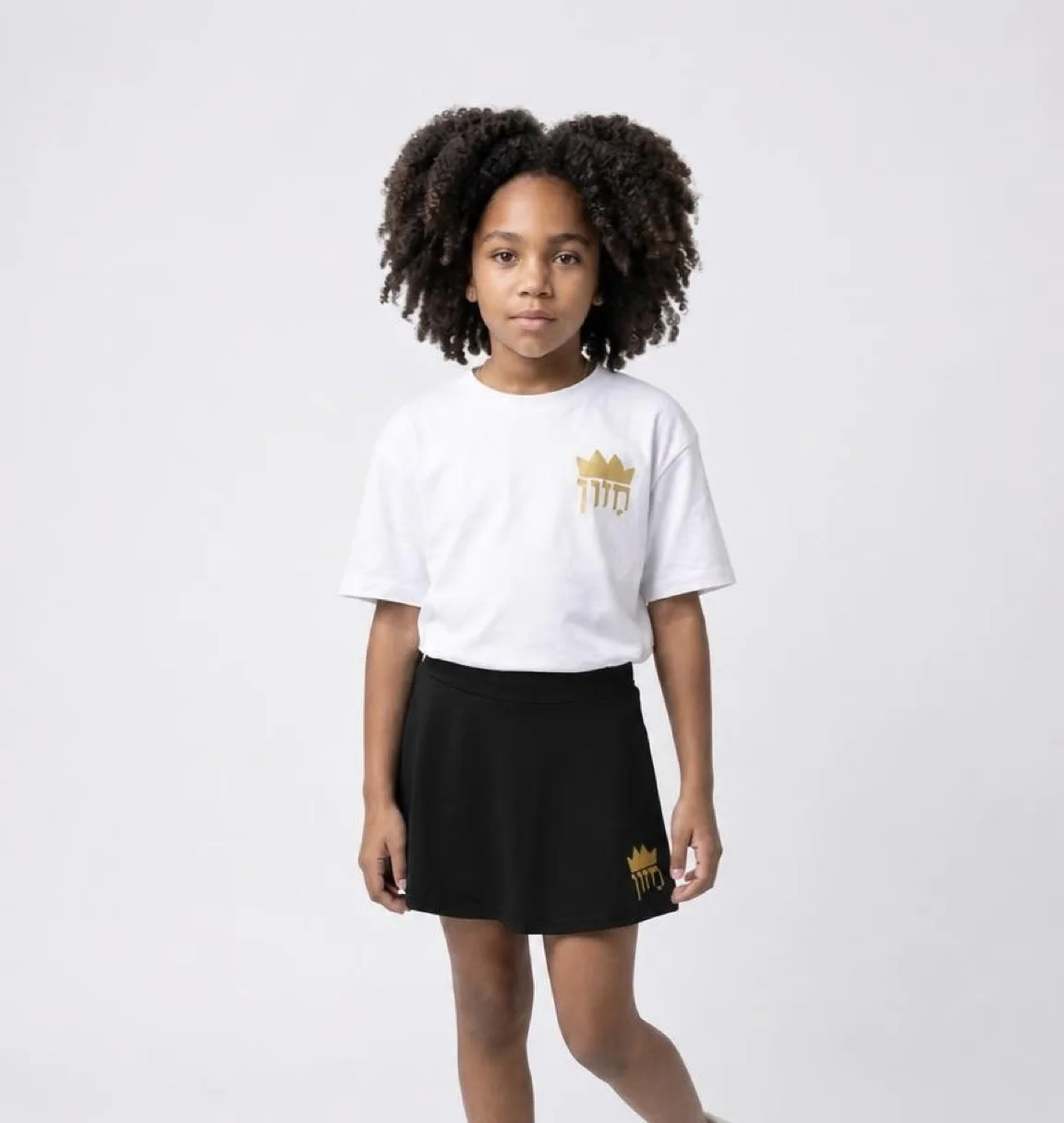 white shirt, black skort on model.jpg