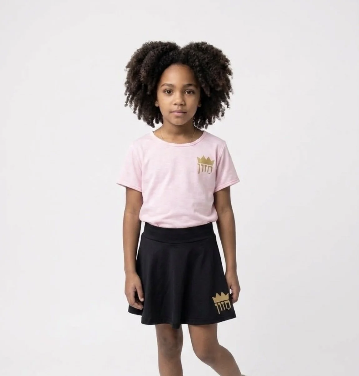 Pink shirt, black Skort on model.jpg