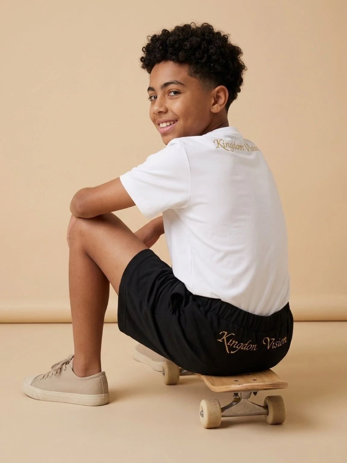 Boys white shirt back on model.jpg