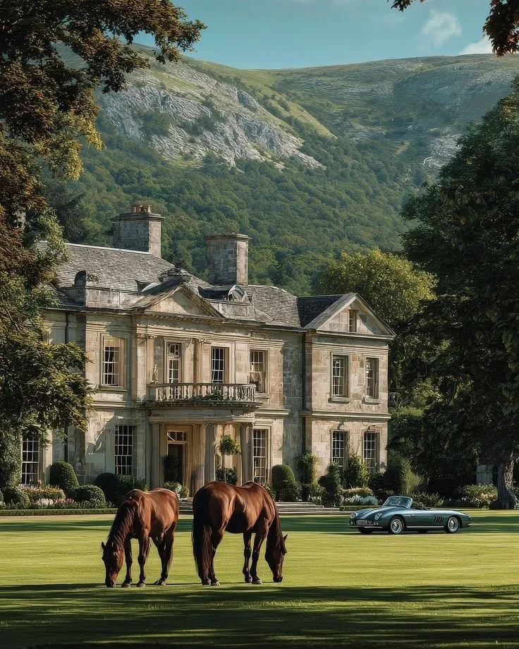 Ravenhoolt Manor website redesign by Gather Studio — historic mansion with manicured gardens, horses and mountain backdrop