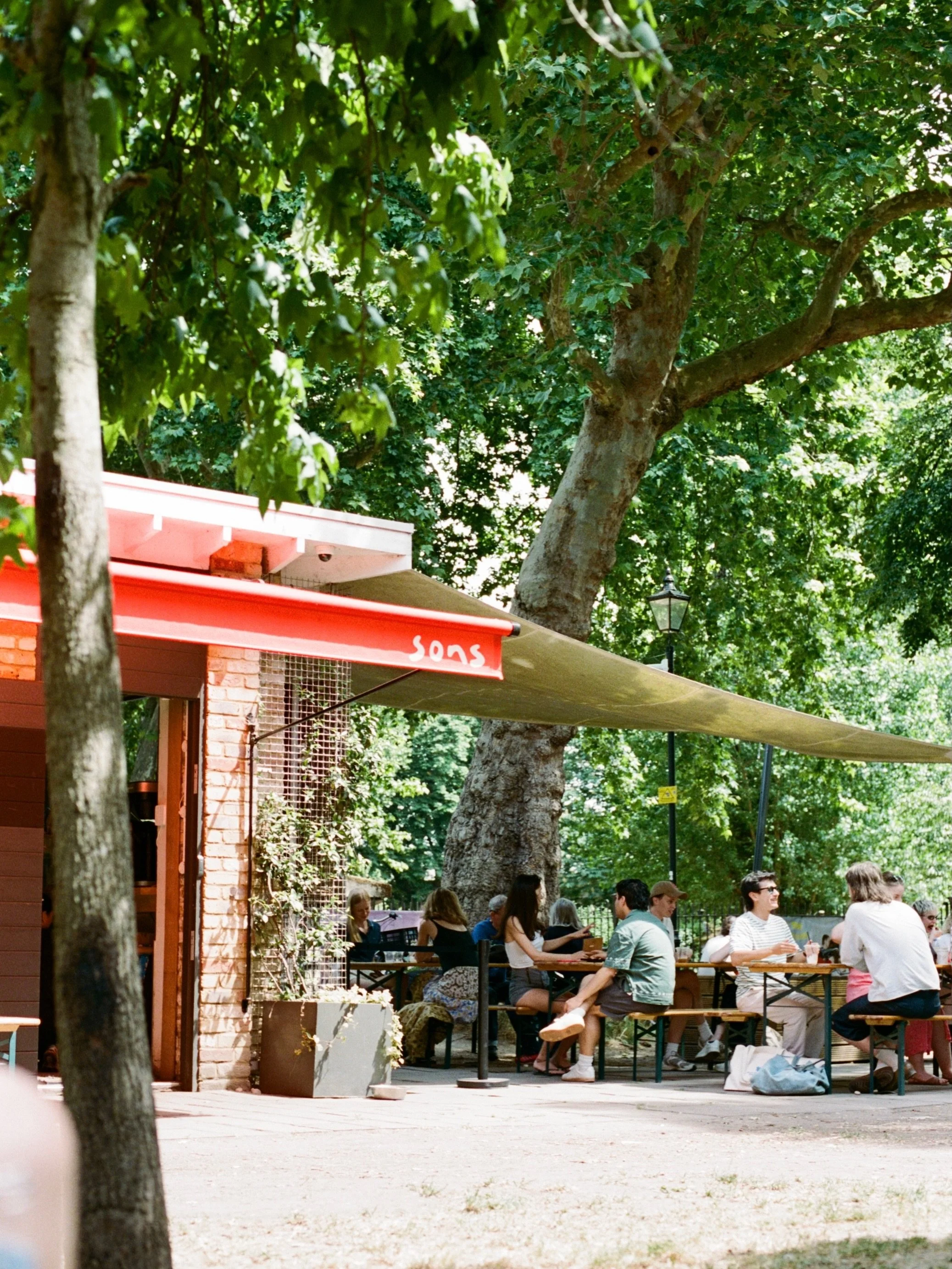Summer at sons is in full swing, don&rsquo;t miss the good times 🌳

Our little Hackney oasis at its best 

A few of our favourite things on the kiosk fridge ❤️

One of many busy summer Saturdays ☀️

Run club legends 🏃&zwj;♀️🏃

Not even a heatwave 